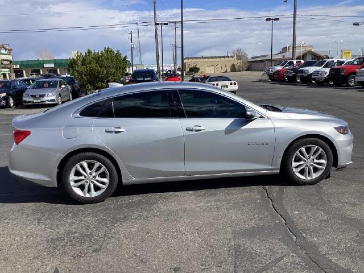 2016 Silver Ice Metallic Chevrolet Malibu SEDAN 4-DR (1G1ZE5ST5GF) with an 1.5L L4 DOHC 16V engine, 6-Speed Automatic transmission, located at 1235 N Woodruff Ave., Idaho Falls, 83401, (208) 523-1053, 43.507172, -112.000488 - The 2016 Malibu received a complete redesign, featuring a more modern and sophisticated exterior styling compared to its predecessor. The new design incorporated sleek lines, a more aerodynamic profile, and a slightly longer wheelbase, giving it a more upscale appearance. At Timberline Auto it is al - Photo#6