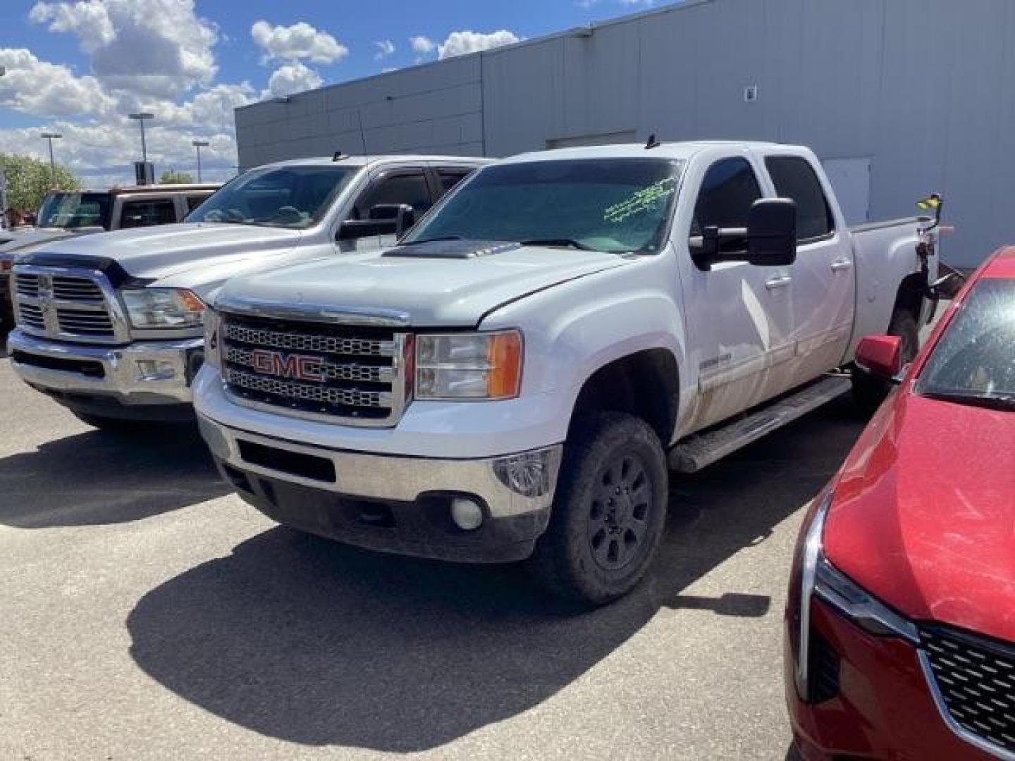 2013 Summit White /Ebony Leather Interior GMC Sierra 2500HD SLT Crew Cab 4WD (1GT121E86DF) with an 6.6L V8 OHV 32V TURBO DIESEL engine, 6-Speed Automatic transmission, located at 1235 N Woodruff Ave., Idaho Falls, 83401, (208) 523-1053, 43.507172, -112.000488 - New Inventory. Going thru service and inspection. Call for more pictures. At Timberline Auto it is always easy to find a great deal on your next vehicle! Our experienced sales staff can help find the right vehicle that will fit your needs. Our knowledgeable finance department has options for almost - Photo#0