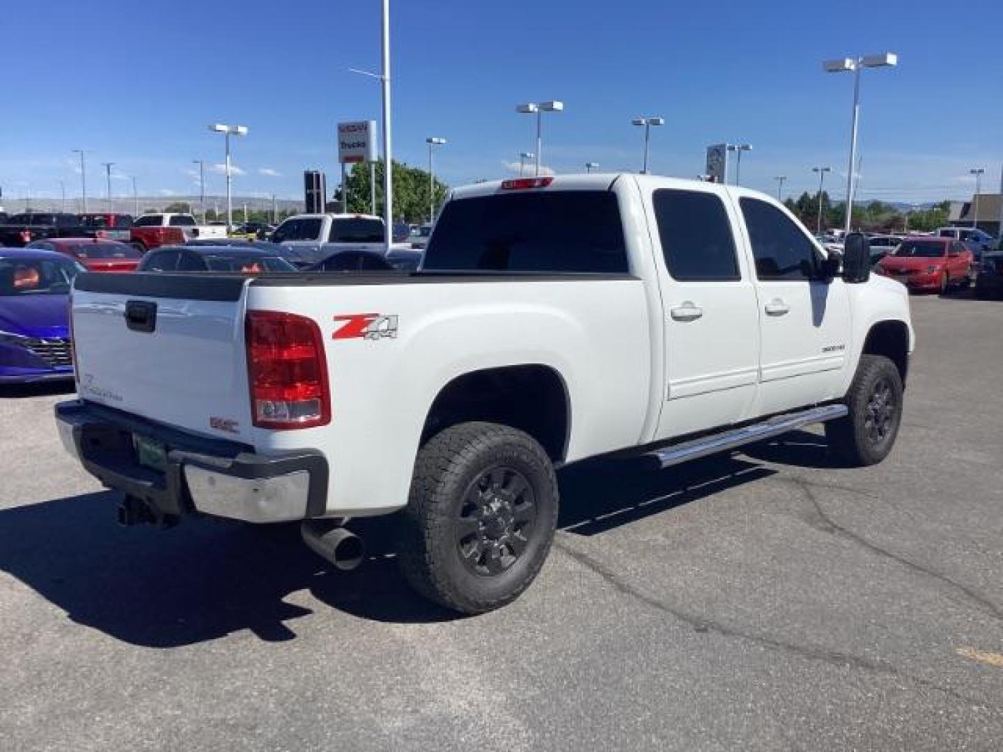 2013 Summit White /Ebony Leather Interior GMC Sierra 2500HD SLT Crew Cab 4WD (1GT121E86DF) with an 6.6L V8 OHV 32V TURBO DIESEL engine, 6-Speed Automatic transmission, located at 1235 N Woodruff Ave., Idaho Falls, 83401, (208) 523-1053, 43.507172, -112.000488 - New Inventory. Going thru service and inspection. Call for more pictures. At Timberline Auto it is always easy to find a great deal on your next vehicle! Our experienced sales staff can help find the right vehicle that will fit your needs. Our knowledgeable finance department has options for almost - Photo#5