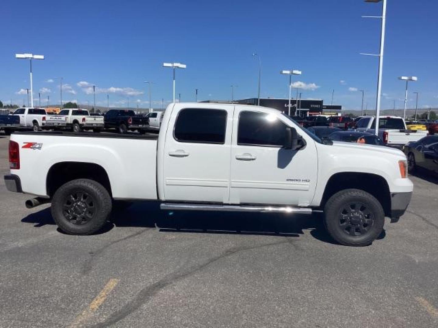 2013 Summit White /Ebony Leather Interior GMC Sierra 2500HD SLT Crew Cab 4WD (1GT121E86DF) with an 6.6L V8 OHV 32V TURBO DIESEL engine, 6-Speed Automatic transmission, located at 1235 N Woodruff Ave., Idaho Falls, 83401, (208) 523-1053, 43.507172, -112.000488 - New Inventory. Going thru service and inspection. Call for more pictures. At Timberline Auto it is always easy to find a great deal on your next vehicle! Our experienced sales staff can help find the right vehicle that will fit your needs. Our knowledgeable finance department has options for almost - Photo#6