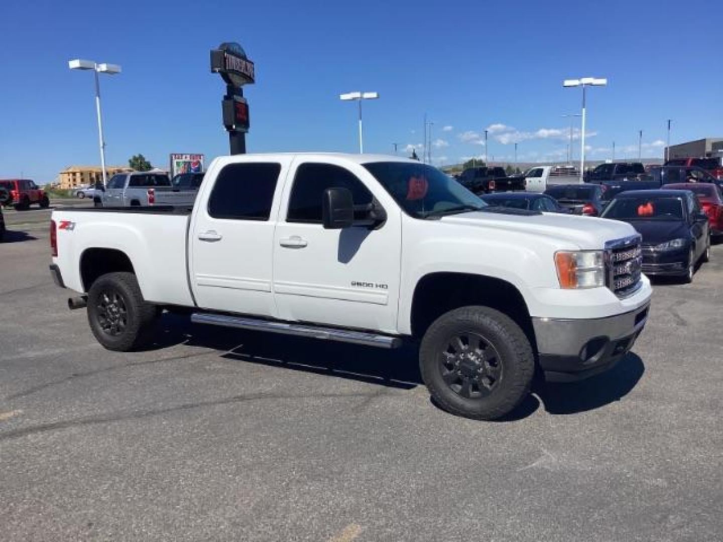 2013 Summit White /Ebony Leather Interior GMC Sierra 2500HD SLT Crew Cab 4WD (1GT121E86DF) with an 6.6L V8 OHV 32V TURBO DIESEL engine, 6-Speed Automatic transmission, located at 1235 N Woodruff Ave., Idaho Falls, 83401, (208) 523-1053, 43.507172, -112.000488 - New Inventory. Going thru service and inspection. Call for more pictures. At Timberline Auto it is always easy to find a great deal on your next vehicle! Our experienced sales staff can help find the right vehicle that will fit your needs. Our knowledgeable finance department has options for almost - Photo#7