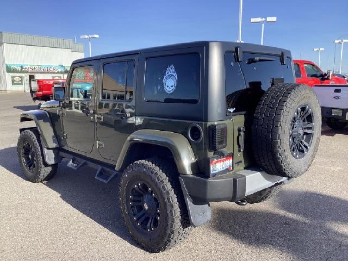 2015 GREEN /Black, cloth Jeep Wrangler Unlimited Sahara 4WD (1C4BJWEG9FL) with an 3.6L V6 DOHC 24V FFV engine, 5-Speed Automatic transmission, located at 1235 N Woodruff Ave., Idaho Falls, 83401, (208) 523-1053, 43.507172, -112.000488 - Photo#2