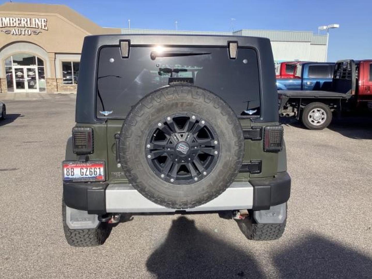 2015 GREEN /Black, cloth Jeep Wrangler Unlimited Sahara 4WD (1C4BJWEG9FL) with an 3.6L V6 DOHC 24V FFV engine, 5-Speed Automatic transmission, located at 1235 N Woodruff Ave., Idaho Falls, 83401, (208) 523-1053, 43.507172, -112.000488 - Photo#3