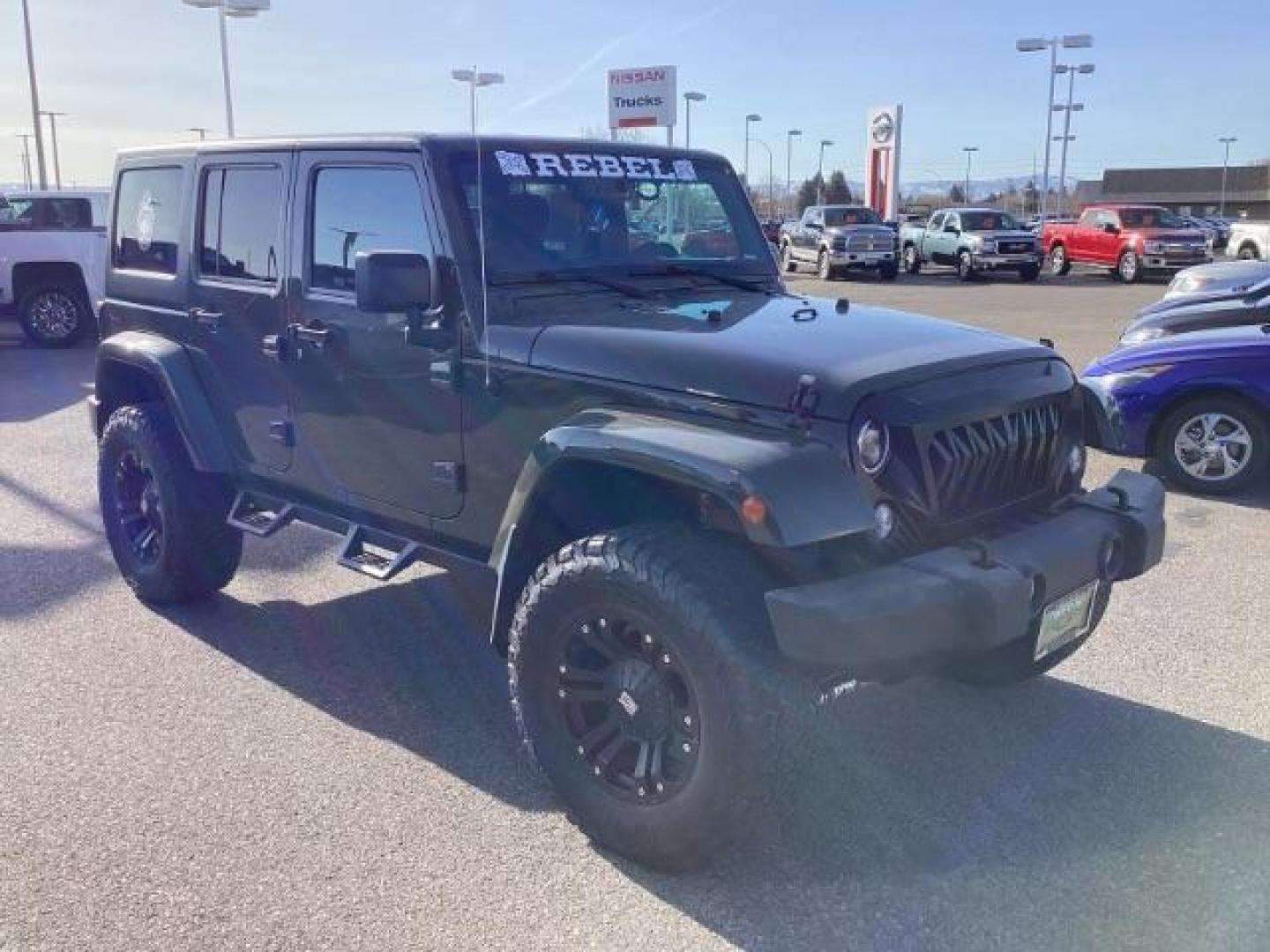 2015 GREEN /Black, cloth Jeep Wrangler Unlimited Sahara 4WD (1C4BJWEG9FL) with an 3.6L V6 DOHC 24V FFV engine, 5-Speed Automatic transmission, located at 1235 N Woodruff Ave., Idaho Falls, 83401, (208) 523-1053, 43.507172, -112.000488 - Photo#6