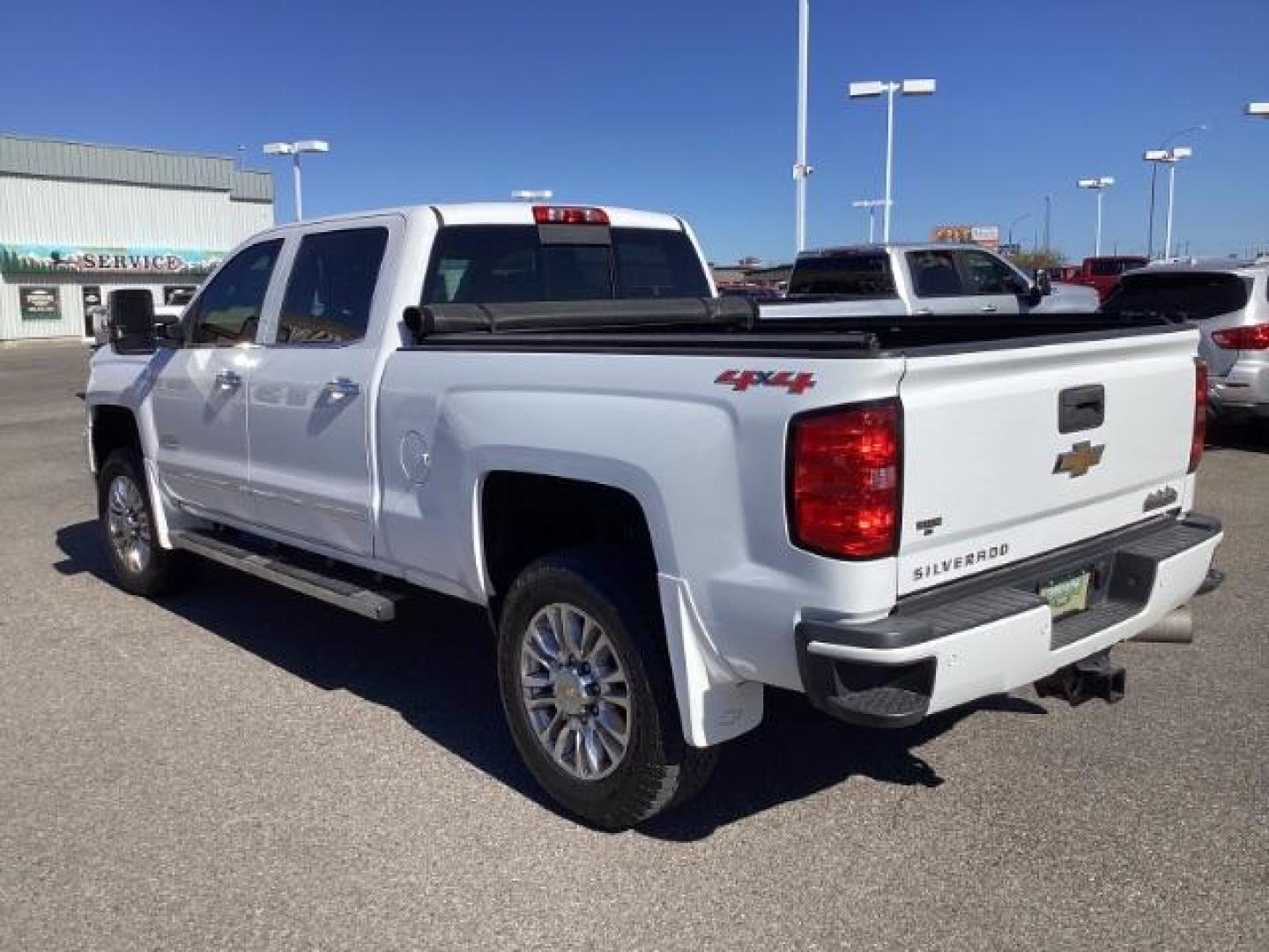 2015 Summit White /Jet Black Chevrolet Silverado 2500HD LT Crew Cab 4WD (1GC1KXE81FF) with an 6.6L V8 OHV 32V TURBO DIESEL engine, 6-Speed Automatic transmission, located at 1235 N Woodruff Ave., Idaho Falls, 83401, (208) 523-1053, 43.507172, -112.000488 - The 2015 Chevrolet Silverado 2500HD High Country Diesel is a top-of-the-line trim level of the Silverado heavy-duty pickup truck, offering a blend of luxury, capability, and advanced technology. Here are some key features you might find on the 2015 Chevrolet Silverado 2500HD High Country Diesel: Dur - Photo#2