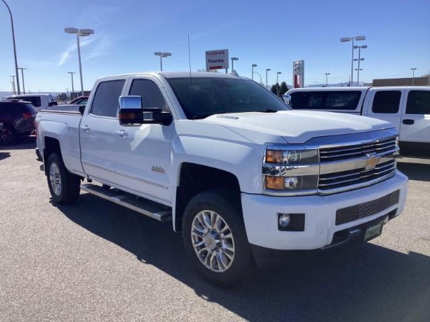 2015 Summit White /Jet Black Chevrolet Silverado 2500HD LT Crew Cab 4WD (1GC1KXE81FF) with an 6.6L V8 OHV 32V TURBO DIESEL engine, 6-Speed Automatic transmission, located at 1235 N Woodruff Ave., Idaho Falls, 83401, (208) 523-1053, 43.507172, -112.000488 - The 2015 Chevrolet Silverado 2500HD High Country Diesel is a top-of-the-line trim level of the Silverado heavy-duty pickup truck, offering a blend of luxury, capability, and advanced technology. Here are some key features you might find on the 2015 Chevrolet Silverado 2500HD High Country Diesel: Dur - Photo#6