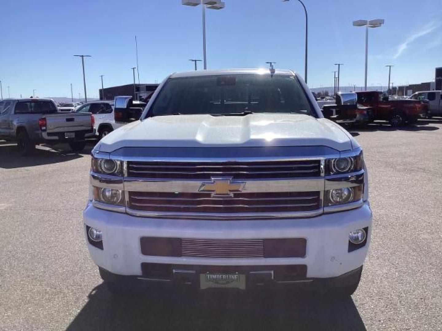 2015 Summit White /Jet Black Chevrolet Silverado 2500HD LT Crew Cab 4WD (1GC1KXE81FF) with an 6.6L V8 OHV 32V TURBO DIESEL engine, 6-Speed Automatic transmission, located at 1235 N Woodruff Ave., Idaho Falls, 83401, (208) 523-1053, 43.507172, -112.000488 - The 2015 Chevrolet Silverado 2500HD High Country Diesel is a top-of-the-line trim level of the Silverado heavy-duty pickup truck, offering a blend of luxury, capability, and advanced technology. Here are some key features you might find on the 2015 Chevrolet Silverado 2500HD High Country Diesel: Dur - Photo#7