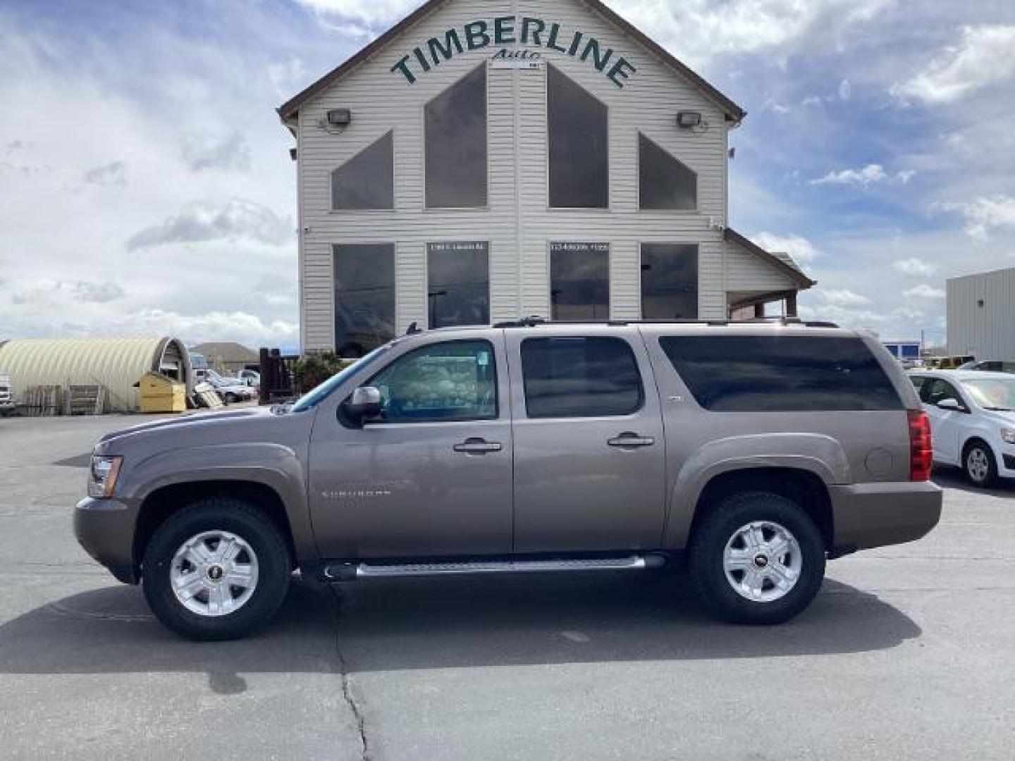 2012 Graystone Metallic /Ebony Leather Interior Chevrolet Suburban LT 1500 4WD (1GNSKJE75CR) with an 5.3L V8 OHV 16V FFV engine, 6-Speed Automatic transmission, located at 1235 N Woodruff Ave., Idaho Falls, 83401, (208) 523-1053, 43.507172, -112.000488 - Photo#1