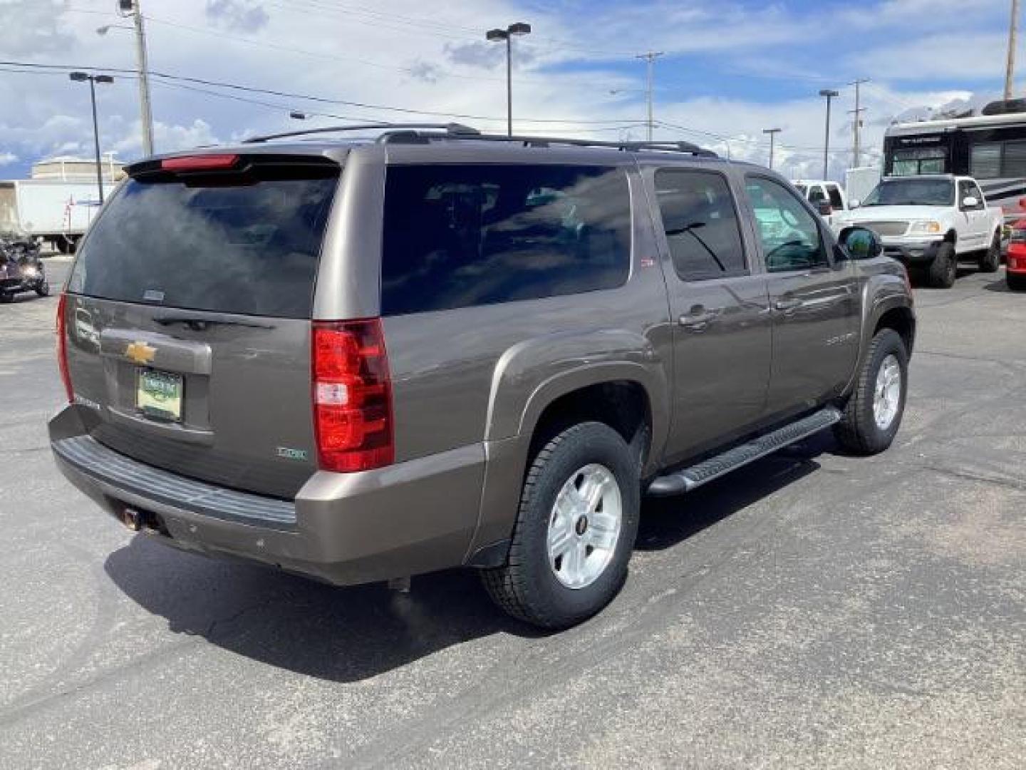 2012 Graystone Metallic /Ebony Leather Interior Chevrolet Suburban LT 1500 4WD (1GNSKJE75CR) with an 5.3L V8 OHV 16V FFV engine, 6-Speed Automatic transmission, located at 1235 N Woodruff Ave., Idaho Falls, 83401, (208) 523-1053, 43.507172, -112.000488 - Photo#4