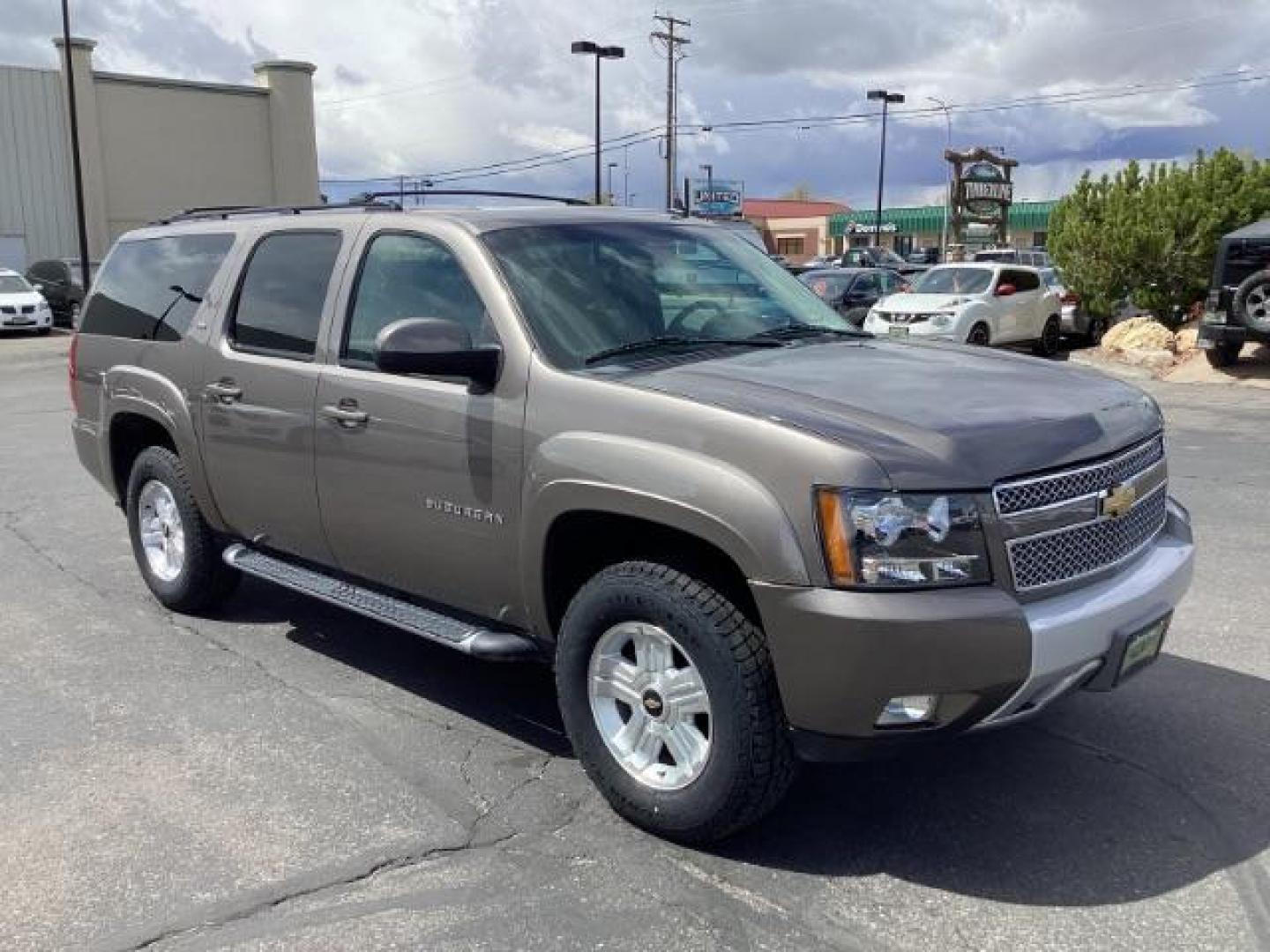 2012 Graystone Metallic /Ebony Leather Interior Chevrolet Suburban LT 1500 4WD (1GNSKJE75CR) with an 5.3L V8 OHV 16V FFV engine, 6-Speed Automatic transmission, located at 1235 N Woodruff Ave., Idaho Falls, 83401, (208) 523-1053, 43.507172, -112.000488 - Photo#6