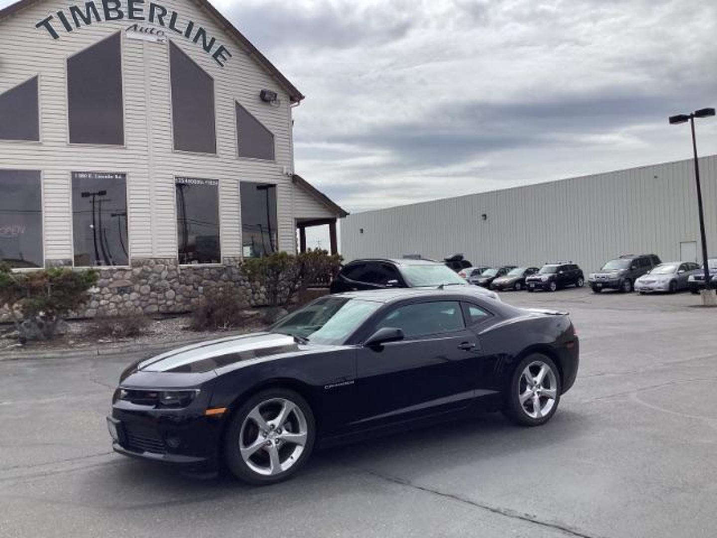 2015 BLACK Chevrolet Camaro 2LT Coupe (2G1FF1E35F9) with an 3.6L V6 DOHC 24V FFV engine, 6-Speed Automatic transmission, located at 1235 N Woodruff Ave., Idaho Falls, 83401, (208) 523-1053, 43.507172, -112.000488 - The 2015 Chevrolet Camaro 2LT RS combines the comfort and technology of the 2LT trim with the sporty styling elements of the RS package. Here are some of the key features you could find in the 2015 Chevrolet Camaro 2LT RS: 3.6-liter V6 Engine: The Camaro 2LT RS is typically powered by a 3.6-liter V - Photo#0