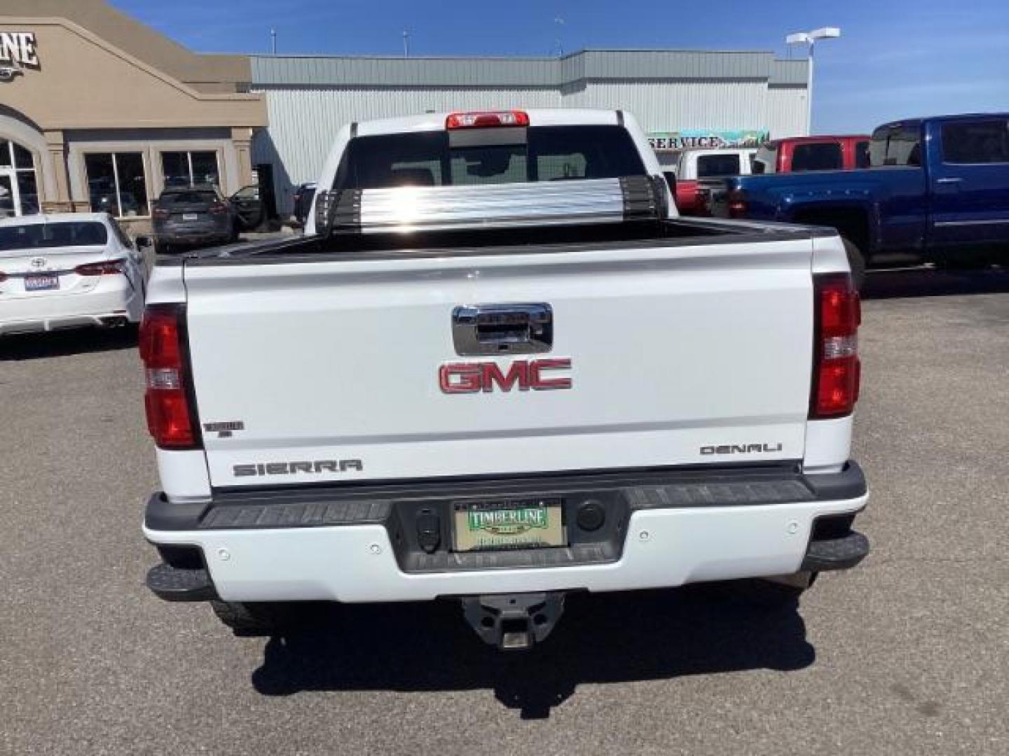 2016 Summit White /Cocoa/Dune, leather GMC Sierra 2500HD Denali Crew Cab 4WD (1GT12UE83GF) with an 6.6L V8 OHV 16 DIESEL engine, 6-Speed Automatic transmission, located at 1235 N Woodruff Ave., Idaho Falls, 83401, (208) 523-1053, 43.507172, -112.000488 - The 2016 GMC Sierra Denali 6.6L typically offers a combination of power, luxury, and capability. Here are some of the key features you can expect to find in this model: Engine: The 6.6-liter V8 turbo diesel engine is one of the standout features of the Sierra Denali. This engine delivers robust per - Photo#3