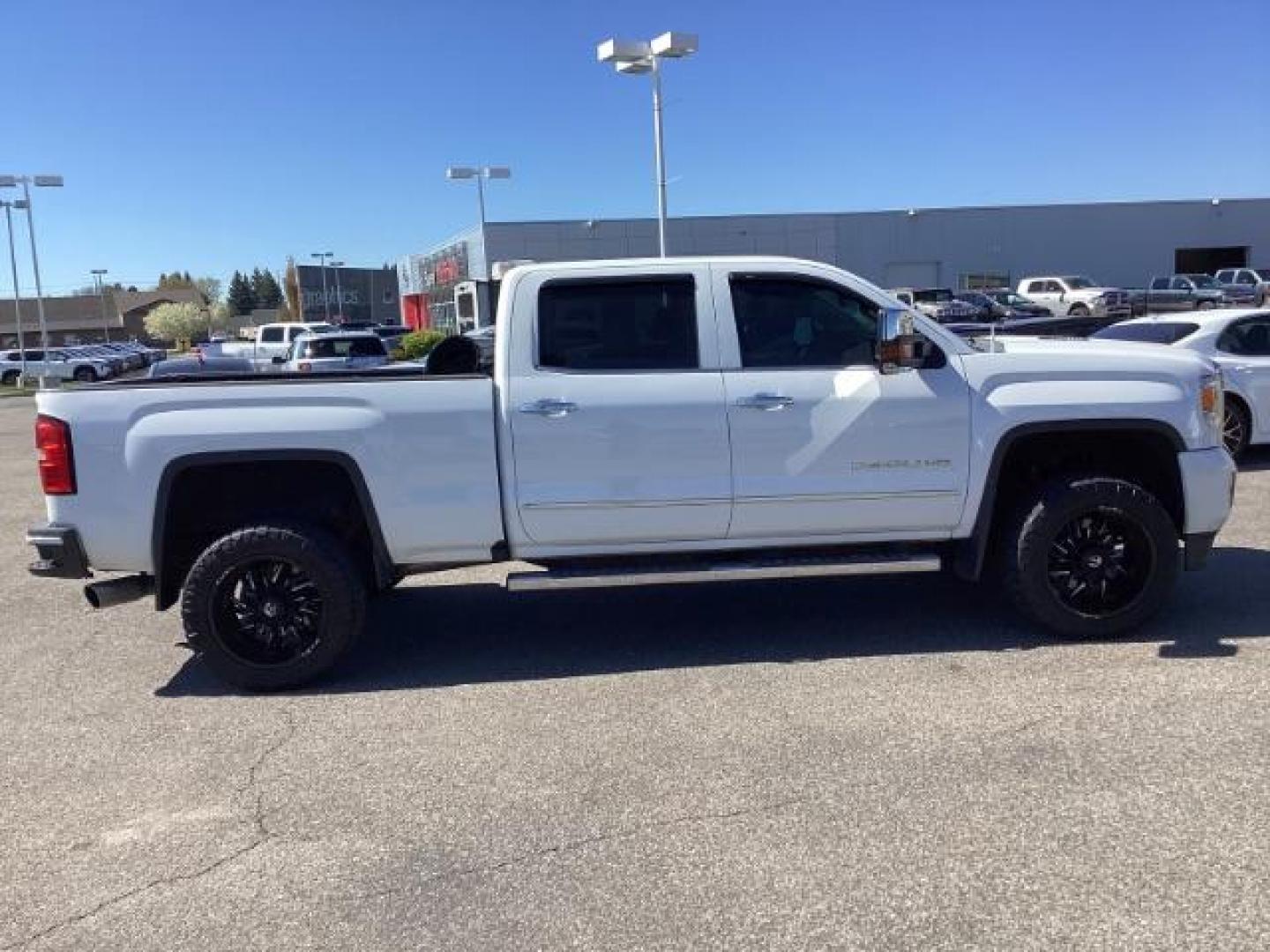 2016 Summit White /Cocoa/Dune, leather GMC Sierra 2500HD Denali Crew Cab 4WD (1GT12UE83GF) with an 6.6L V8 OHV 16 DIESEL engine, 6-Speed Automatic transmission, located at 1235 N Woodruff Ave., Idaho Falls, 83401, (208) 523-1053, 43.507172, -112.000488 - The 2016 GMC Sierra Denali 6.6L typically offers a combination of power, luxury, and capability. Here are some of the key features you can expect to find in this model: Engine: The 6.6-liter V8 turbo diesel engine is one of the standout features of the Sierra Denali. This engine delivers robust per - Photo#5