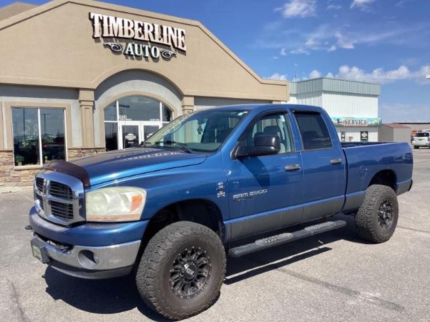 2006 Atlantic Blue Pearlcoat /Medium Slate Gray Cloth Interior Dodge Ram 2500 SLT Quad Cab 4WD (3D7KS28C36G) with an 5.9L L6 OHV 24V TURBO DIESEL engine, 6-Speed Manual transmission, located at 1235 N Woodruff Ave., Idaho Falls, 83401, (208) 523-1053, 43.507172, -112.000488 - Photo#0