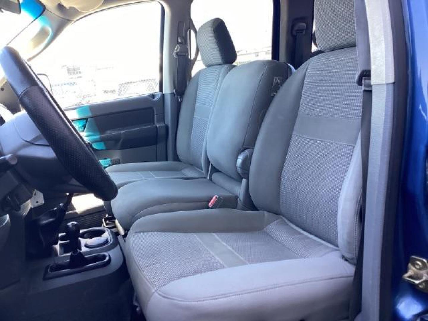 2006 Atlantic Blue Pearlcoat /Medium Slate Gray Cloth Interior Dodge Ram 2500 SLT Quad Cab 4WD (3D7KS28C36G) with an 5.9L L6 OHV 24V TURBO DIESEL engine, 6-Speed Manual transmission, located at 1235 N Woodruff Ave., Idaho Falls, 83401, (208) 523-1053, 43.507172, -112.000488 - Photo#11