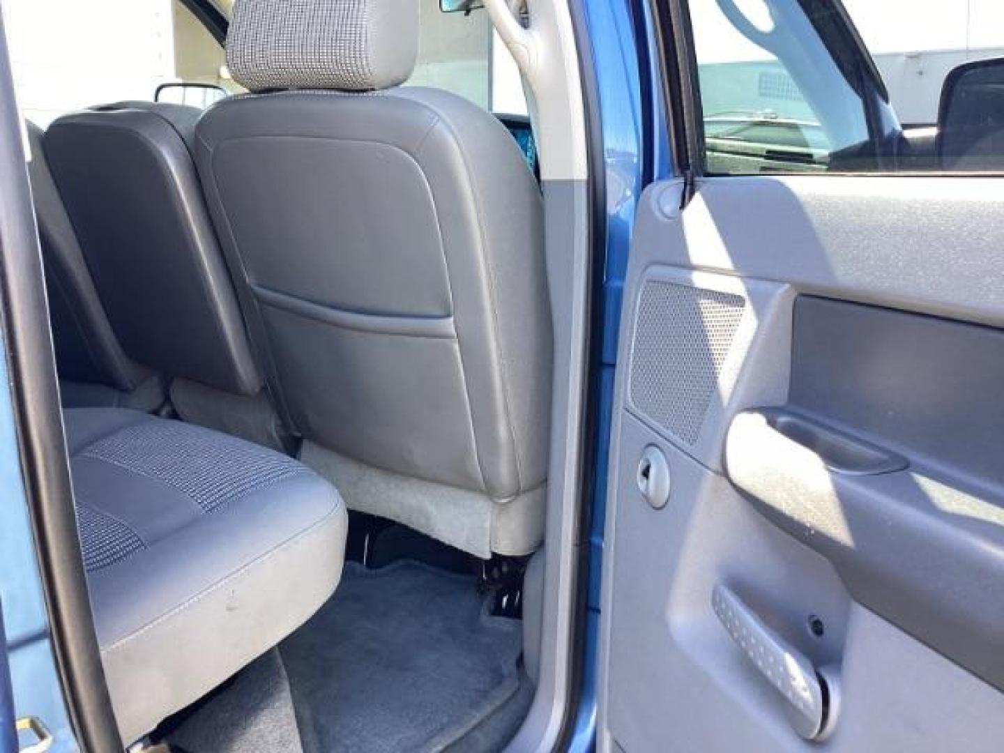 2006 Atlantic Blue Pearlcoat /Medium Slate Gray Cloth Interior Dodge Ram 2500 SLT Quad Cab 4WD (3D7KS28C36G) with an 5.9L L6 OHV 24V TURBO DIESEL engine, 6-Speed Manual transmission, located at 1235 N Woodruff Ave., Idaho Falls, 83401, (208) 523-1053, 43.507172, -112.000488 - Photo#18