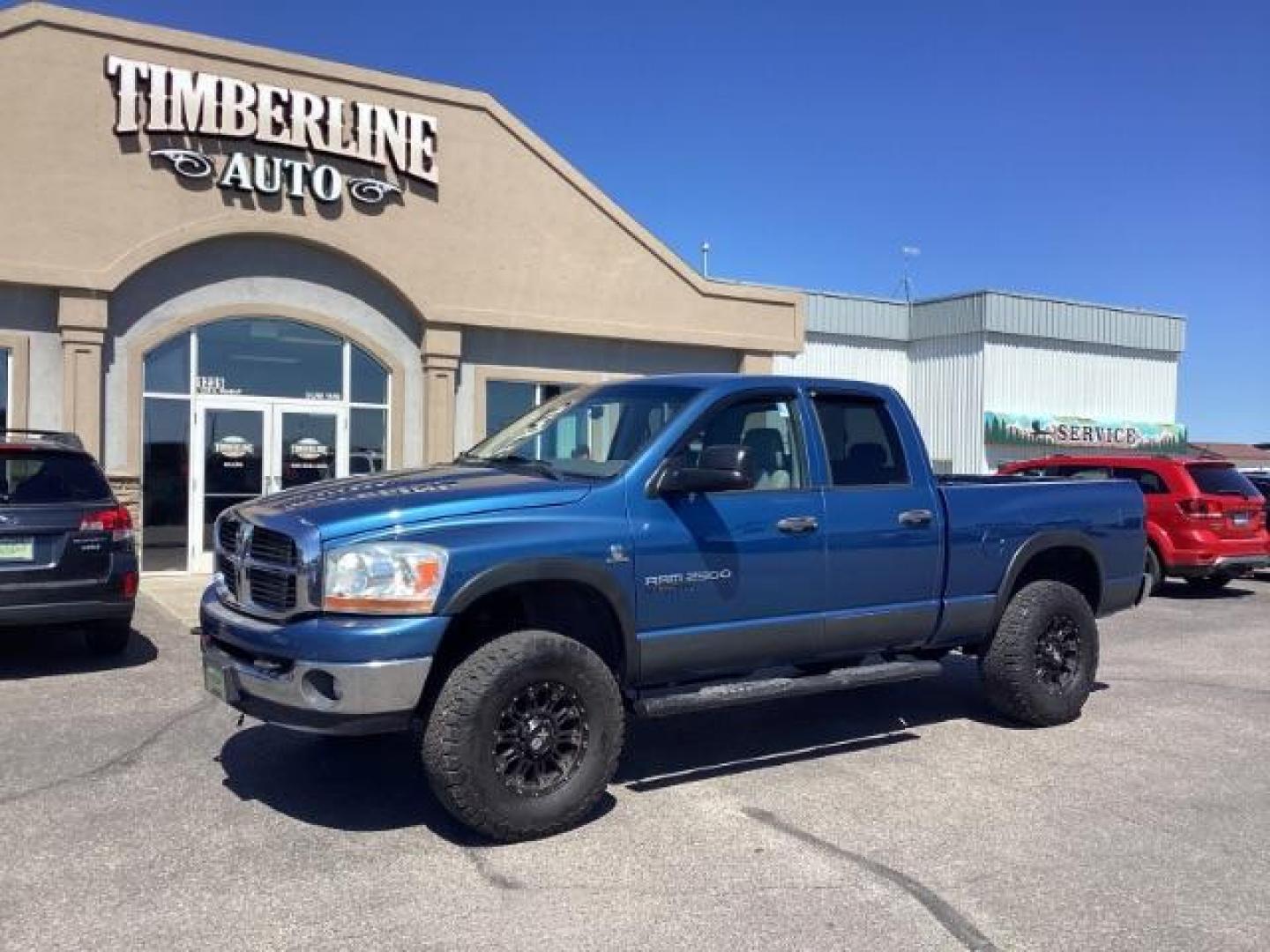 2006 Atlantic Blue Pearlcoat /Medium Slate Gray Cloth Interior Dodge Ram 2500 SLT Quad Cab 4WD (3D7KS28C36G) with an 5.9L L6 OHV 24V TURBO DIESEL engine, 6-Speed Manual transmission, located at 1235 N Woodruff Ave., Idaho Falls, 83401, (208) 523-1053, 43.507172, -112.000488 - Photo#1