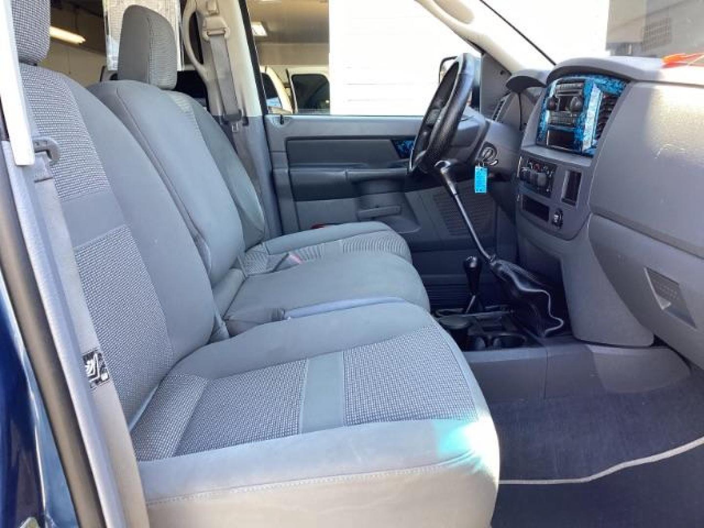 2006 Atlantic Blue Pearlcoat /Medium Slate Gray Cloth Interior Dodge Ram 2500 SLT Quad Cab 4WD (3D7KS28C36G) with an 5.9L L6 OHV 24V TURBO DIESEL engine, 6-Speed Manual transmission, located at 1235 N Woodruff Ave., Idaho Falls, 83401, (208) 523-1053, 43.507172, -112.000488 - Photo#20