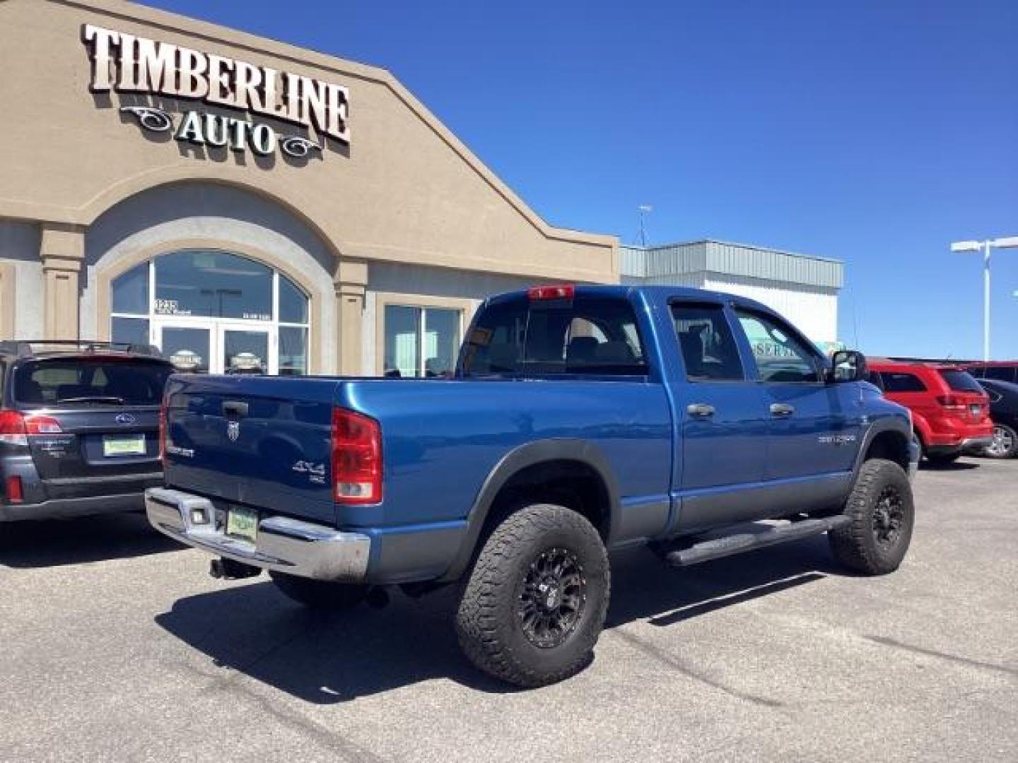 2006 Atlantic Blue Pearlcoat /Medium Slate Gray Cloth Interior Dodge Ram 2500 SLT Quad Cab 4WD (3D7KS28C36G) with an 5.9L L6 OHV 24V TURBO DIESEL engine, 6-Speed Manual transmission, located at 1235 N Woodruff Ave., Idaho Falls, 83401, (208) 523-1053, 43.507172, -112.000488 - Photo#5