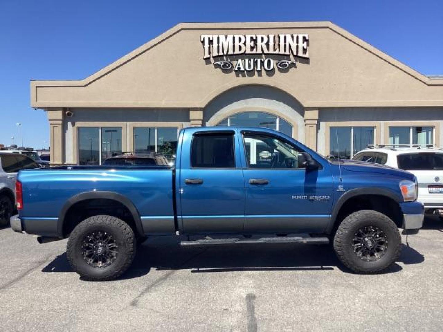 2006 Atlantic Blue Pearlcoat /Medium Slate Gray Cloth Interior Dodge Ram 2500 SLT Quad Cab 4WD (3D7KS28C36G) with an 5.9L L6 OHV 24V TURBO DIESEL engine, 6-Speed Manual transmission, located at 1235 N Woodruff Ave., Idaho Falls, 83401, (208) 523-1053, 43.507172, -112.000488 - Photo#6