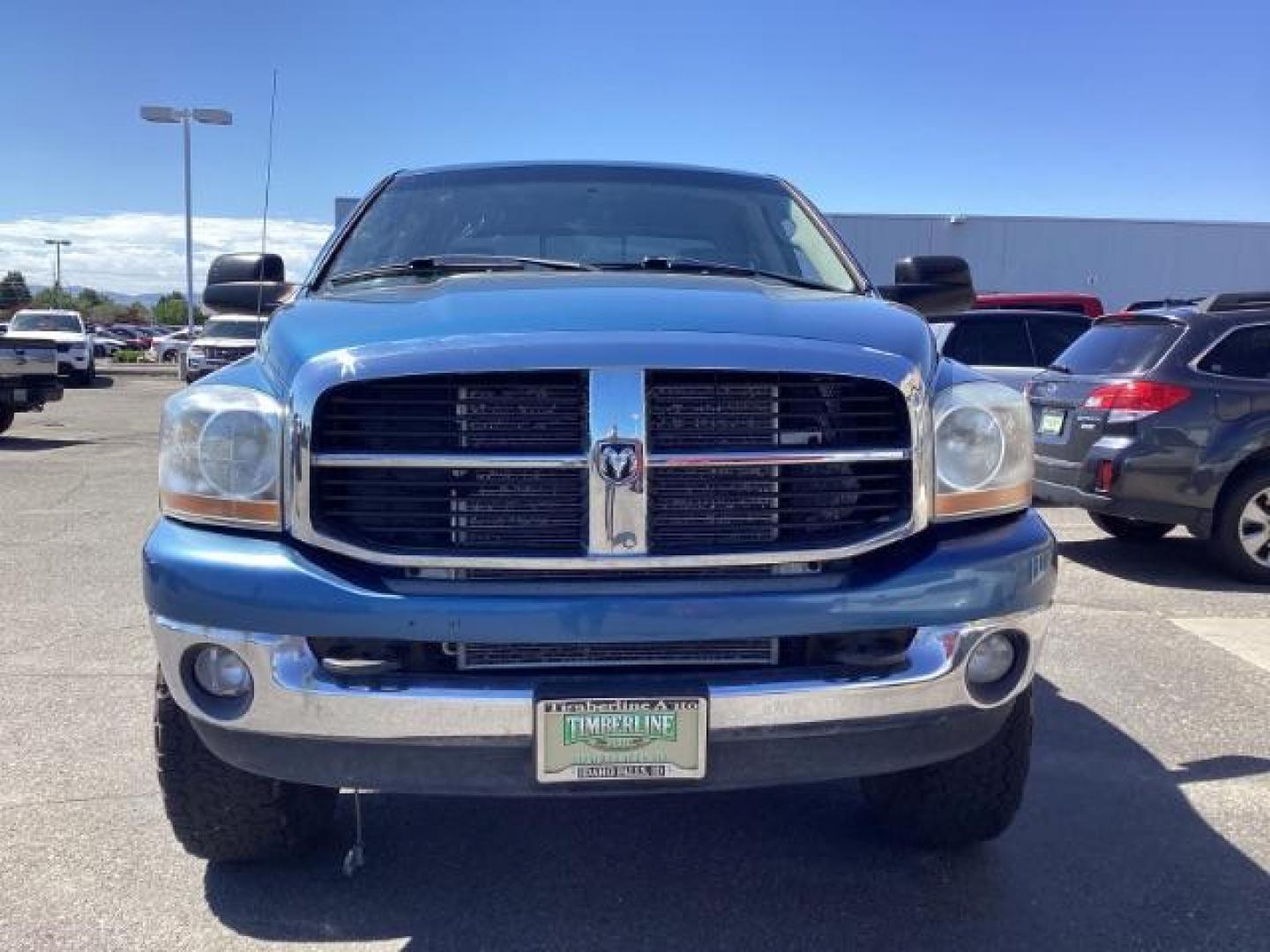 2006 Atlantic Blue Pearlcoat /Medium Slate Gray Cloth Interior Dodge Ram 2500 SLT Quad Cab 4WD (3D7KS28C36G) with an 5.9L L6 OHV 24V TURBO DIESEL engine, 6-Speed Manual transmission, located at 1235 N Woodruff Ave., Idaho Falls, 83401, (208) 523-1053, 43.507172, -112.000488 - Photo#7