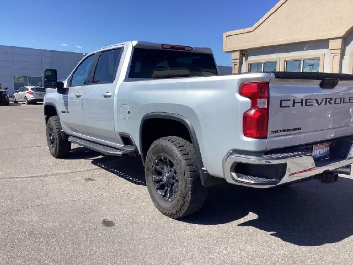 2021 SILVER /Jet Black, leather Chevrolet Silverado 2500HD LT Crew Cab Short Box 4WD (1GC4YNEY1MF) with an 6.6L V8 OHV 16V DIESEL engine, 6-Speed Automatic transmission, located at 1235 N Woodruff Ave., Idaho Falls, 83401, (208) 523-1053, 43.507172, -112.000488 - Photo#2