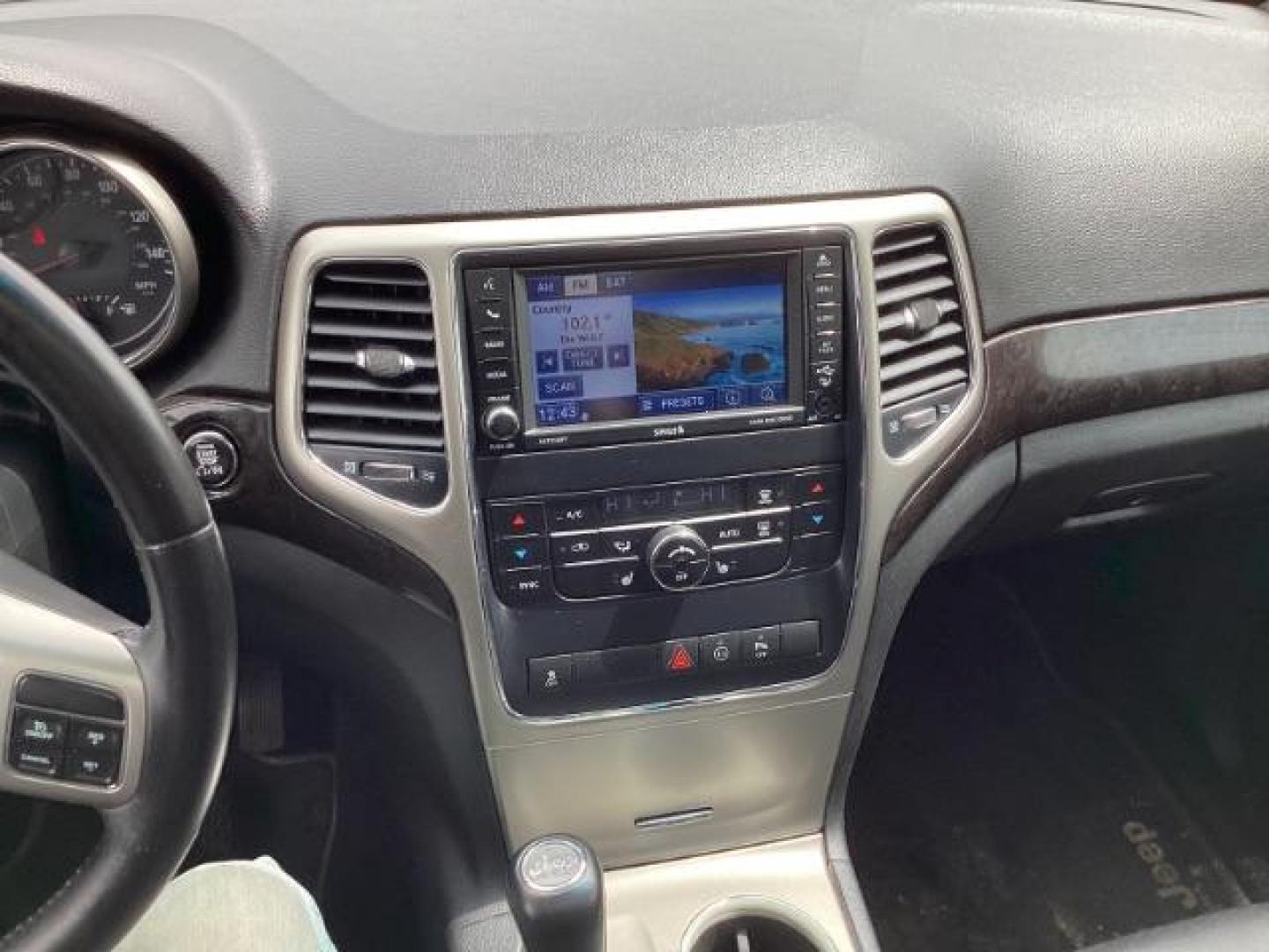 2012 Mineral Gray Metallic Jeep Grand Cherokee Laredo 4WD (1C4RJFAG3CC) with an 3.6L V6 DOHC 24V engine, 5-Speed Automatic transmission, located at 1235 N Woodruff Ave., Idaho Falls, 83401, (208) 523-1053, 43.507172, -112.000488 - The 2012 Jeep Grand Cherokee Laredo 4x4 offers a range of features suitable for both on-road comfort and off-road capability. Here are some of the key features you might find on this model: Engine Options: The Grand Cherokee Laredo might come with a choice of engines, including a V6 or V8 engine. T - Photo#10