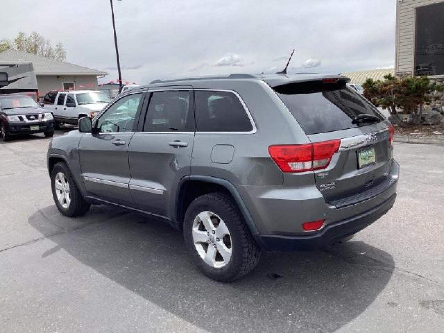 2012 Mineral Gray Metallic Jeep Grand Cherokee Laredo 4WD (1C4RJFAG3CC) with an 3.6L V6 DOHC 24V engine, 5-Speed Automatic transmission, located at 1235 N Woodruff Ave., Idaho Falls, 83401, (208) 523-1053, 43.507172, -112.000488 - The 2012 Jeep Grand Cherokee Laredo 4x4 offers a range of features suitable for both on-road comfort and off-road capability. Here are some of the key features you might find on this model: Engine Options: The Grand Cherokee Laredo might come with a choice of engines, including a V6 or V8 engine. T - Photo#2