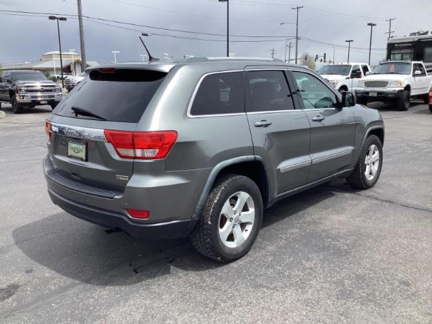 2012 Mineral Gray Metallic Jeep Grand Cherokee Laredo 4WD (1C4RJFAG3CC) with an 3.6L V6 DOHC 24V engine, 5-Speed Automatic transmission, located at 1235 N Woodruff Ave., Idaho Falls, 83401, (208) 523-1053, 43.507172, -112.000488 - The 2012 Jeep Grand Cherokee Laredo 4x4 offers a range of features suitable for both on-road comfort and off-road capability. Here are some of the key features you might find on this model: Engine Options: The Grand Cherokee Laredo might come with a choice of engines, including a V6 or V8 engine. T - Photo#4