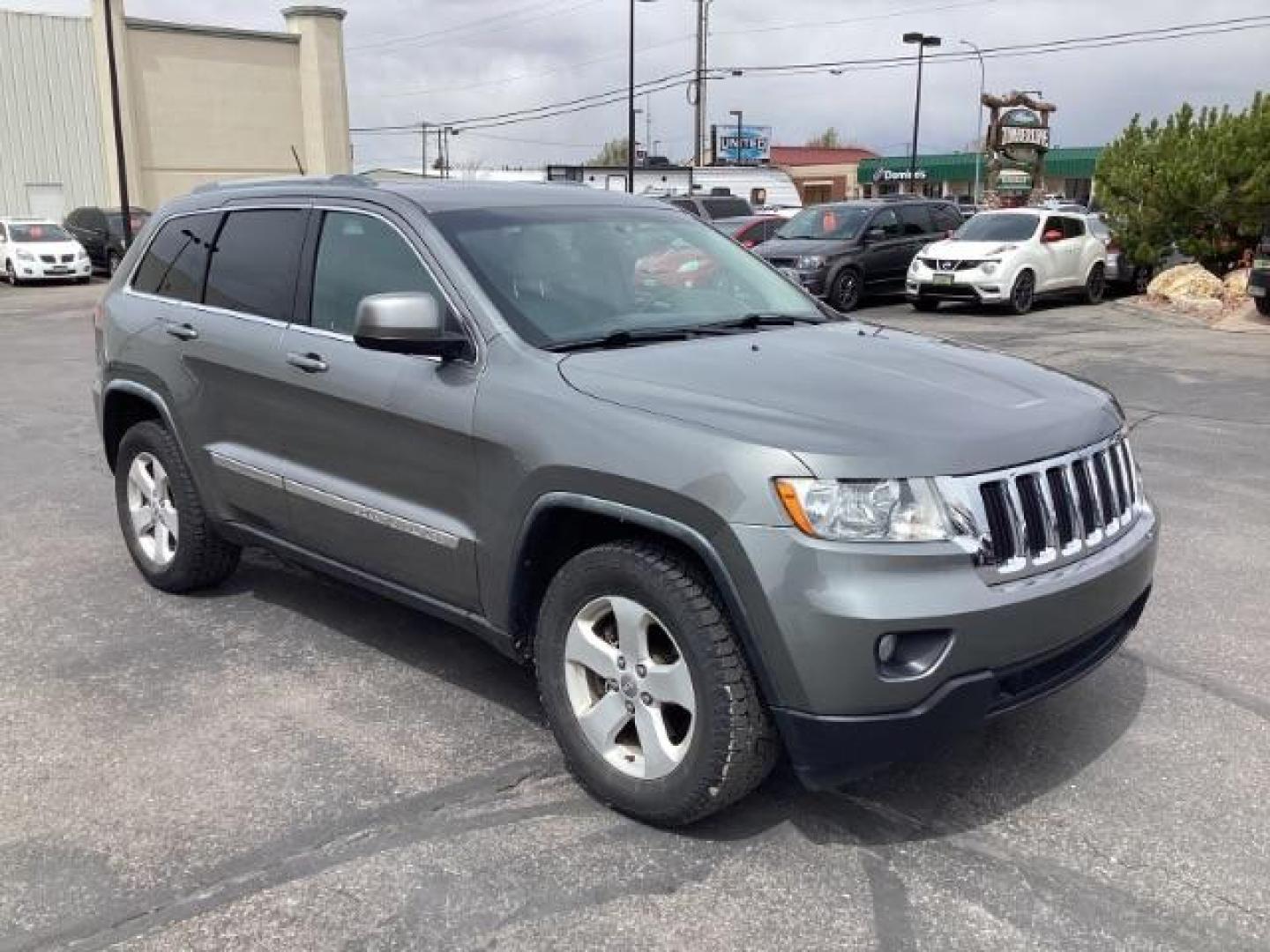 2012 Mineral Gray Metallic Jeep Grand Cherokee Laredo 4WD (1C4RJFAG3CC) with an 3.6L V6 DOHC 24V engine, 5-Speed Automatic transmission, located at 1235 N Woodruff Ave., Idaho Falls, 83401, (208) 523-1053, 43.507172, -112.000488 - The 2012 Jeep Grand Cherokee Laredo 4x4 offers a range of features suitable for both on-road comfort and off-road capability. Here are some of the key features you might find on this model: Engine Options: The Grand Cherokee Laredo might come with a choice of engines, including a V6 or V8 engine. T - Photo#6