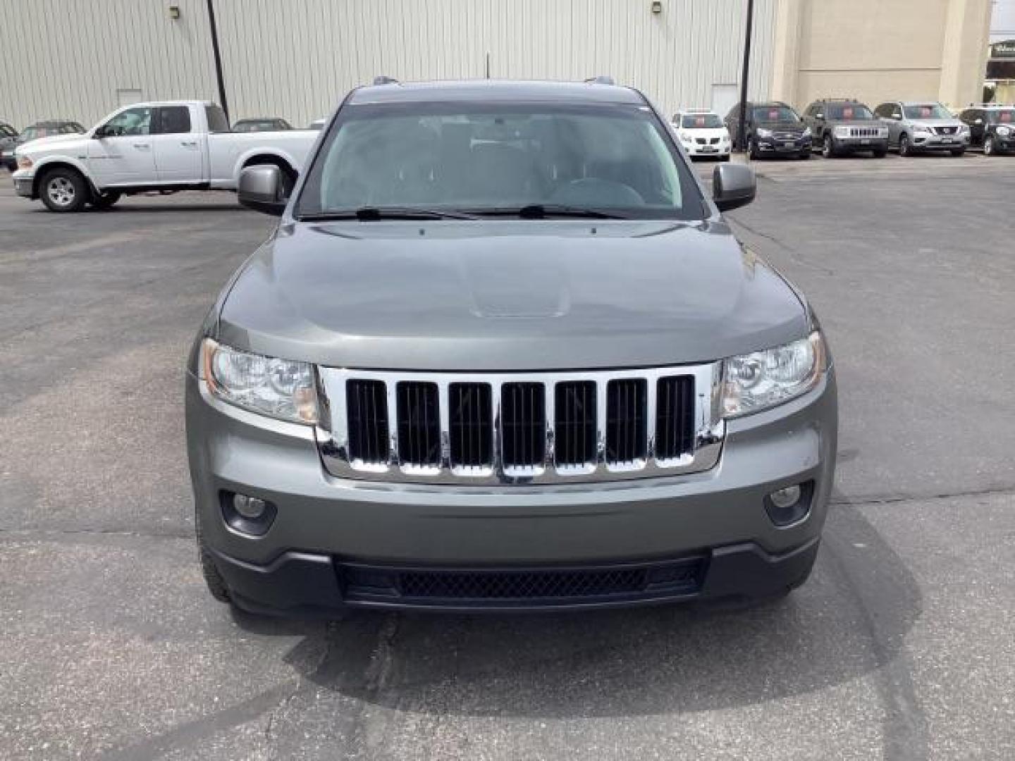 2012 Mineral Gray Metallic Jeep Grand Cherokee Laredo 4WD (1C4RJFAG3CC) with an 3.6L V6 DOHC 24V engine, 5-Speed Automatic transmission, located at 1235 N Woodruff Ave., Idaho Falls, 83401, (208) 523-1053, 43.507172, -112.000488 - The 2012 Jeep Grand Cherokee Laredo 4x4 offers a range of features suitable for both on-road comfort and off-road capability. Here are some of the key features you might find on this model: Engine Options: The Grand Cherokee Laredo might come with a choice of engines, including a V6 or V8 engine. T - Photo#7