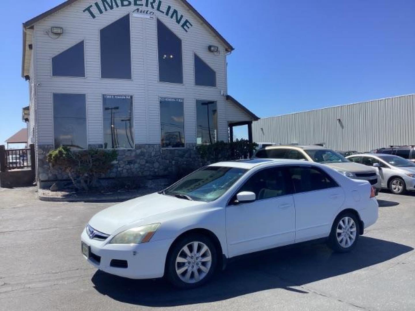 2007 Taffeta White /Gray Cloth Interior Honda Accord LX V-6 Sedan AT (1HGCM66357A) with an 3.0L V6 SOHC 24V engine, 5-Speed Automatic transmission, located at 1235 N Woodruff Ave., Idaho Falls, 83401, (208) 523-1053, 43.507172, -112.000488 - The 2007 Honda Accord LX V6 is a midsize sedan known for its reliability, comfort, and performance. Here are some of the key features you might find on the 2007 Honda Accord LX V6 trim: 3.0-liter V6 Engine: The Accord LX V6 is powered by a 3.0-liter V6 engine, providing smooth acceleration and ampl - Photo#0