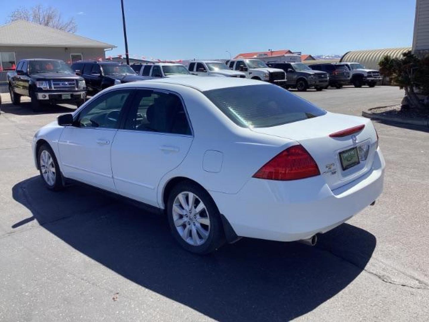 2007 Taffeta White /Gray Cloth Interior Honda Accord LX V-6 Sedan AT (1HGCM66357A) with an 3.0L V6 SOHC 24V engine, 5-Speed Automatic transmission, located at 1235 N Woodruff Ave., Idaho Falls, 83401, (208) 523-1053, 43.507172, -112.000488 - The 2007 Honda Accord LX V6 is a midsize sedan known for its reliability, comfort, and performance. Here are some of the key features you might find on the 2007 Honda Accord LX V6 trim: 3.0-liter V6 Engine: The Accord LX V6 is powered by a 3.0-liter V6 engine, providing smooth acceleration and ampl - Photo#2