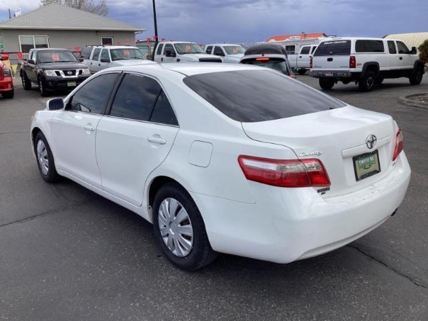 2008 Super White /Ash Cloth Interior Toyota Camry LE 5-Spd AT (4T4BE46K48R) with an 2.4L L4 DOHC 16V engine, 5-Speed Automatic transmission, located at 1235 N Woodruff Ave., Idaho Falls, 83401, (208) 523-1053, 43.507172, -112.000488 - The 2008 Toyota Camry LE is a midsize sedan known for its reliability, comfort, and practicality. Here are the key features you might find on the 2008 Toyota Camry LE: Engine: Typically equipped with a 2.4-liter inline-four engine producing around 158 horsepower and 161 lb-ft of torque, paired with - Photo#2