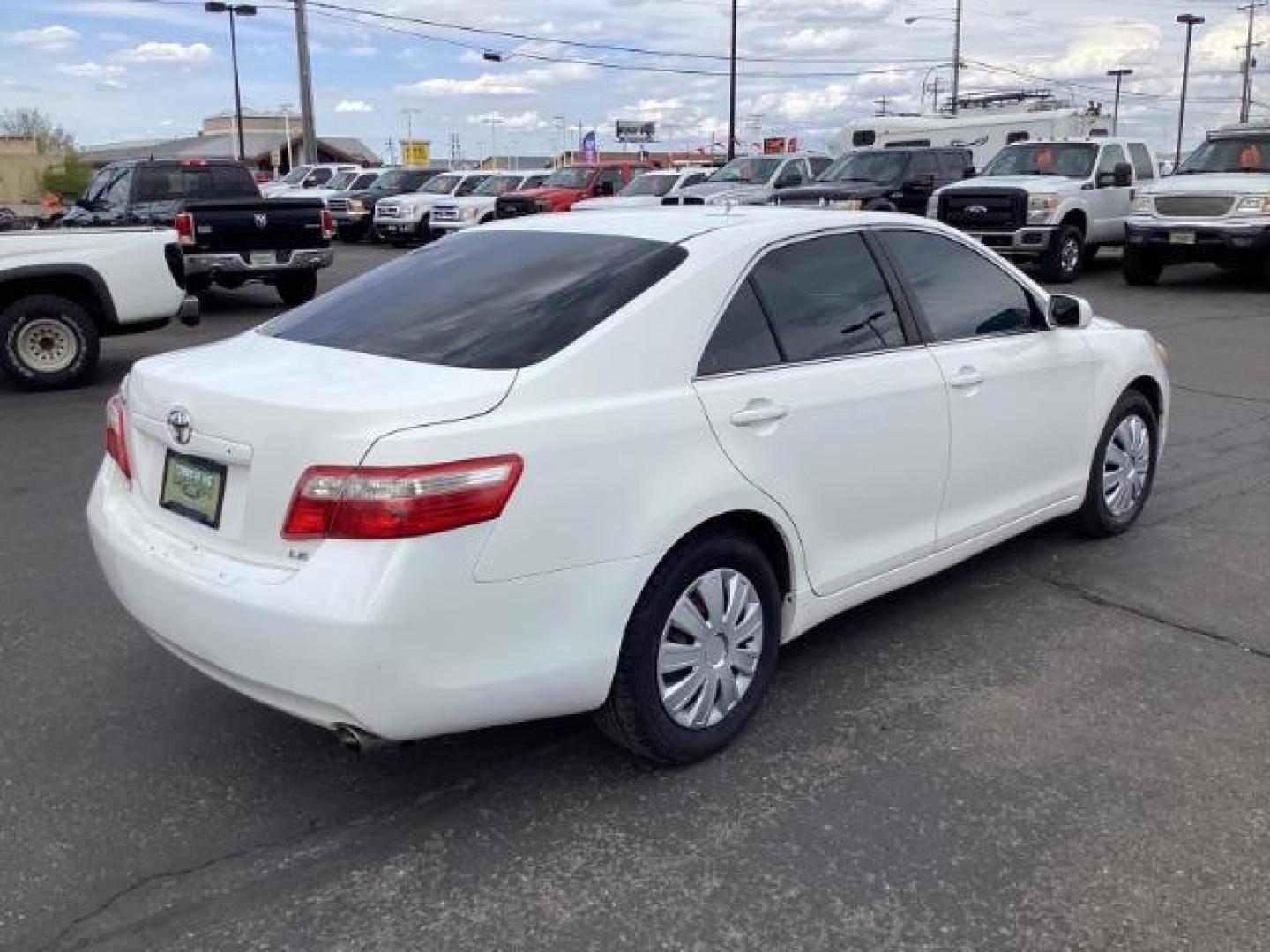 2008 Super White /Ash Cloth Interior Toyota Camry LE 5-Spd AT (4T4BE46K48R) with an 2.4L L4 DOHC 16V engine, 5-Speed Automatic transmission, located at 1235 N Woodruff Ave., Idaho Falls, 83401, (208) 523-1053, 43.507172, -112.000488 - The 2008 Toyota Camry LE is a midsize sedan known for its reliability, comfort, and practicality. Here are the key features you might find on the 2008 Toyota Camry LE: Engine: Typically equipped with a 2.4-liter inline-four engine producing around 158 horsepower and 161 lb-ft of torque, paired with - Photo#4