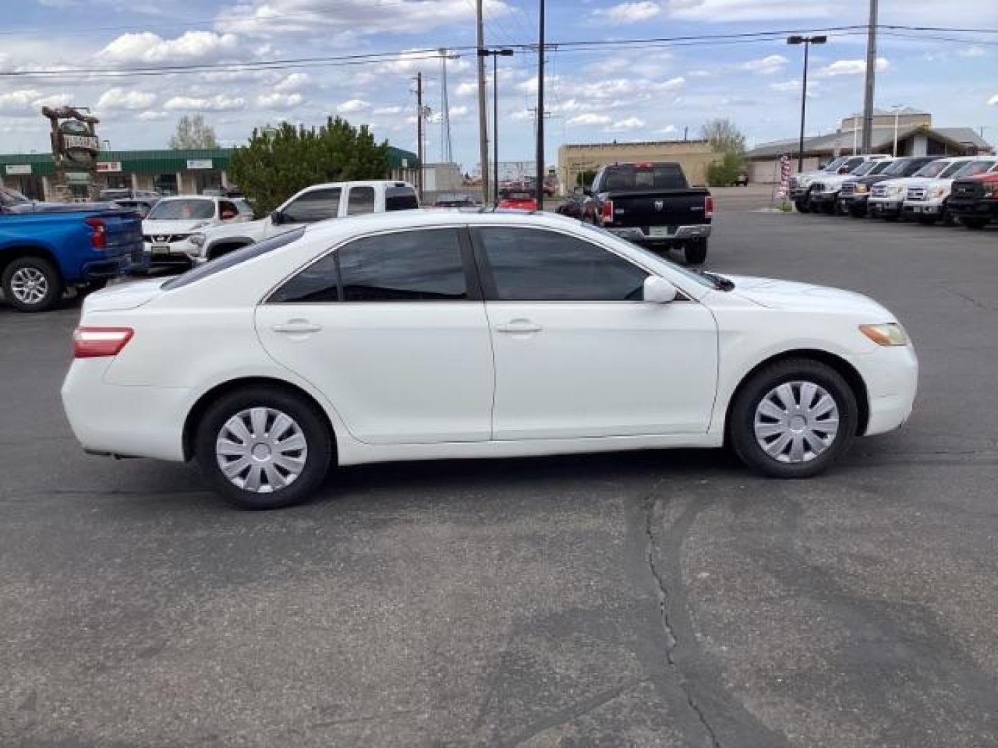 2008 Super White /Ash Cloth Interior Toyota Camry LE 5-Spd AT (4T4BE46K48R) with an 2.4L L4 DOHC 16V engine, 5-Speed Automatic transmission, located at 1235 N Woodruff Ave., Idaho Falls, 83401, (208) 523-1053, 43.507172, -112.000488 - The 2008 Toyota Camry LE is a midsize sedan known for its reliability, comfort, and practicality. Here are the key features you might find on the 2008 Toyota Camry LE: Engine: Typically equipped with a 2.4-liter inline-four engine producing around 158 horsepower and 161 lb-ft of torque, paired with - Photo#5