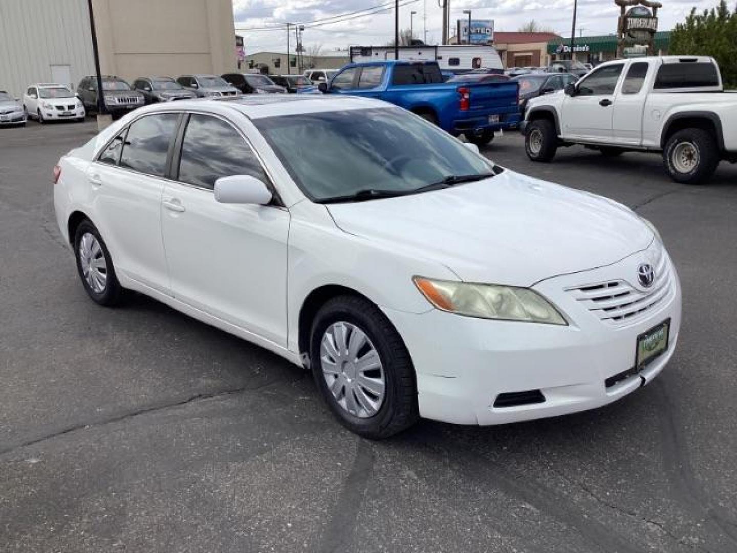 2008 Super White /Ash Cloth Interior Toyota Camry LE 5-Spd AT (4T4BE46K48R) with an 2.4L L4 DOHC 16V engine, 5-Speed Automatic transmission, located at 1235 N Woodruff Ave., Idaho Falls, 83401, (208) 523-1053, 43.507172, -112.000488 - The 2008 Toyota Camry LE is a midsize sedan known for its reliability, comfort, and practicality. Here are the key features you might find on the 2008 Toyota Camry LE: Engine: Typically equipped with a 2.4-liter inline-four engine producing around 158 horsepower and 161 lb-ft of torque, paired with - Photo#6