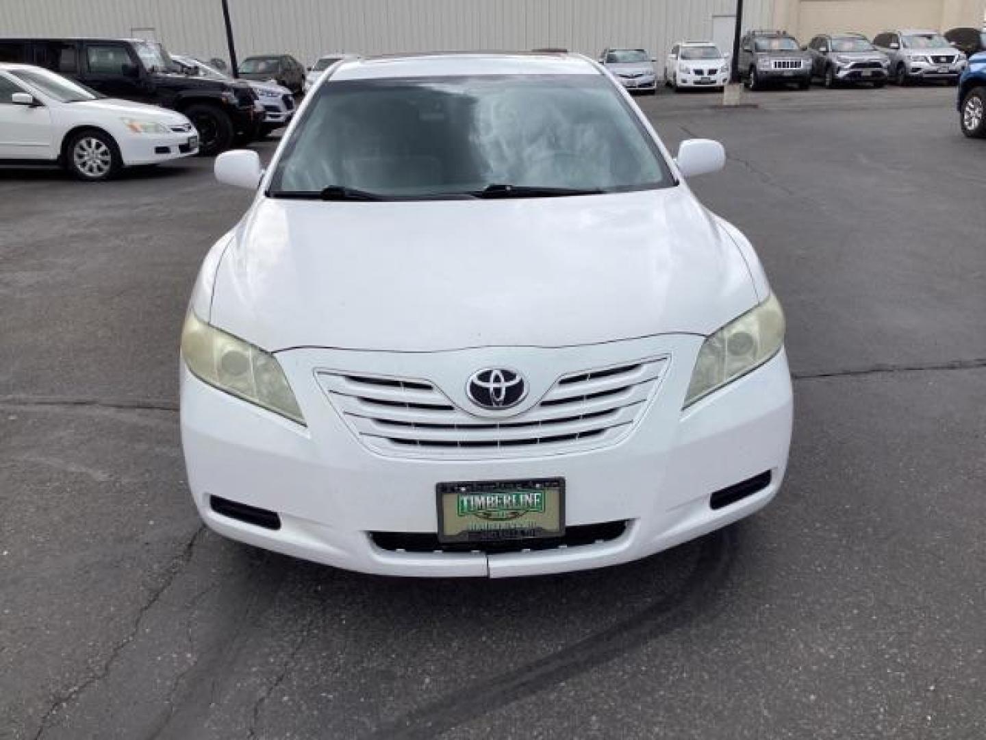 2008 Super White /Ash Cloth Interior Toyota Camry LE 5-Spd AT (4T4BE46K48R) with an 2.4L L4 DOHC 16V engine, 5-Speed Automatic transmission, located at 1235 N Woodruff Ave., Idaho Falls, 83401, (208) 523-1053, 43.507172, -112.000488 - The 2008 Toyota Camry LE is a midsize sedan known for its reliability, comfort, and practicality. Here are the key features you might find on the 2008 Toyota Camry LE: Engine: Typically equipped with a 2.4-liter inline-four engine producing around 158 horsepower and 161 lb-ft of torque, paired with - Photo#7