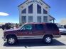 1999 Victory Red Chevrolet Tahoe 4-Door 4WD (1GNEK13R6XJ) with an 5.7L V8 OHV 16V engine, 4-Speed Automatic transmission, located at 1235 N Woodruff Ave., Idaho Falls, 83401, (208) 523-1053, 43.507172, -112.000488 - Photo#1