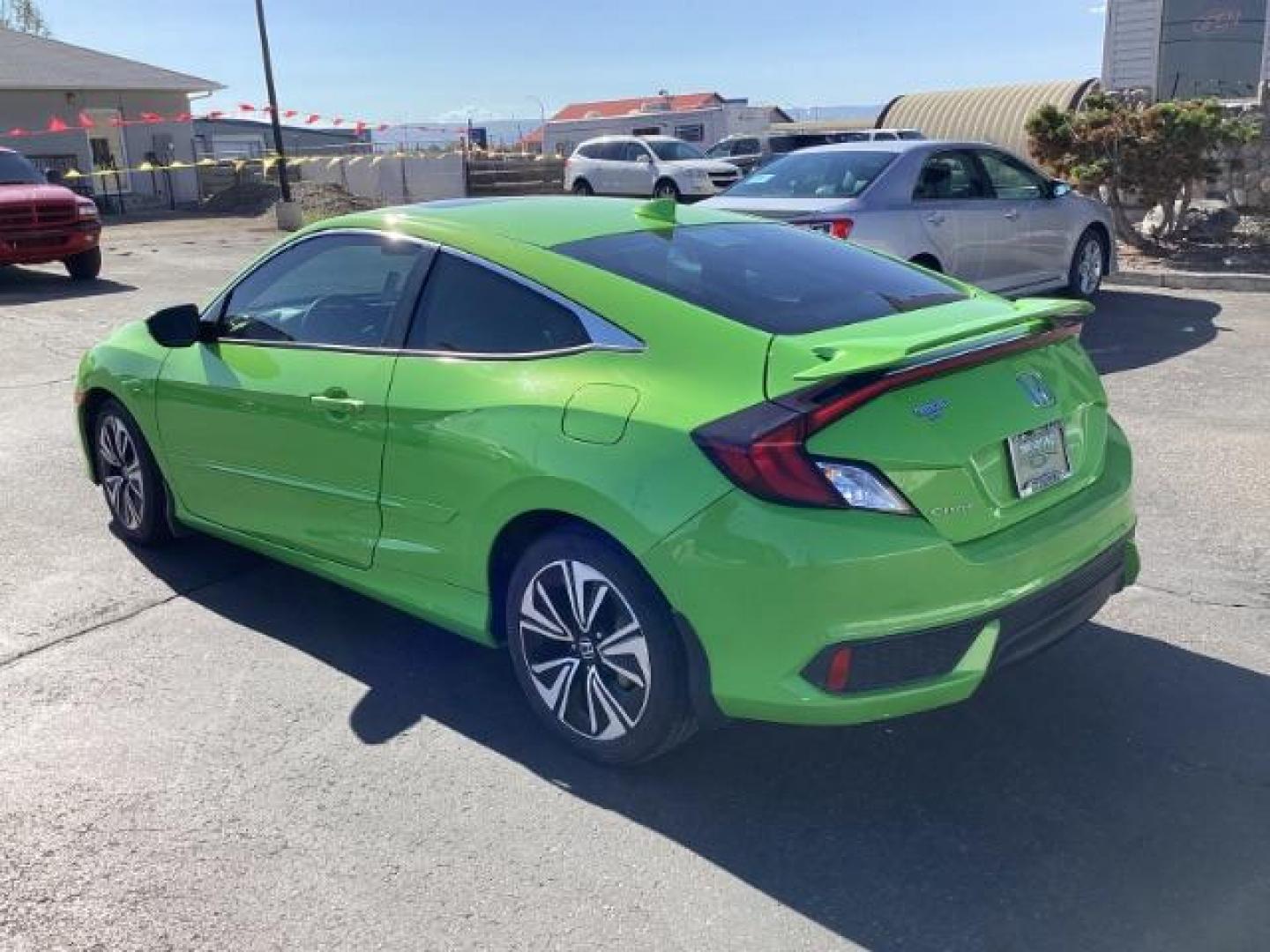 2016 Honda Civic EX-T Coupe CVT (2HGFC3B3XGH) with an 1.5L L4 SOHC 16V engine, Continuously Variable Transmission transmission, located at 1235 N Woodruff Ave., Idaho Falls, 83401, (208) 523-1053, 43.507172, -112.000488 - The 2016 Honda Civic EX coupe offers a blend of sportiness, efficiency, and technology. Here are some key features you can expect: Engine: The EX trim typically comes with a 2.0-liter four-cylinder engine that delivers a good balance of power and fuel efficiency. Transmission: It is usually paired - Photo#1