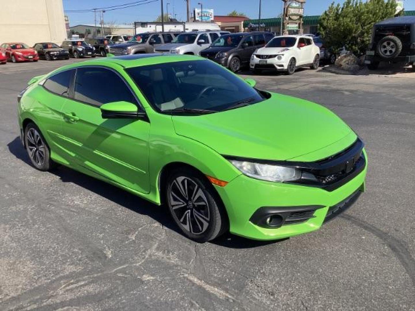 2016 Honda Civic EX-T Coupe CVT (2HGFC3B3XGH) with an 1.5L L4 SOHC 16V engine, Continuously Variable Transmission transmission, located at 1235 N Woodruff Ave., Idaho Falls, 83401, (208) 523-1053, 43.507172, -112.000488 - The 2016 Honda Civic EX coupe offers a blend of sportiness, efficiency, and technology. Here are some key features you can expect: Engine: The EX trim typically comes with a 2.0-liter four-cylinder engine that delivers a good balance of power and fuel efficiency. Transmission: It is usually paired - Photo#6