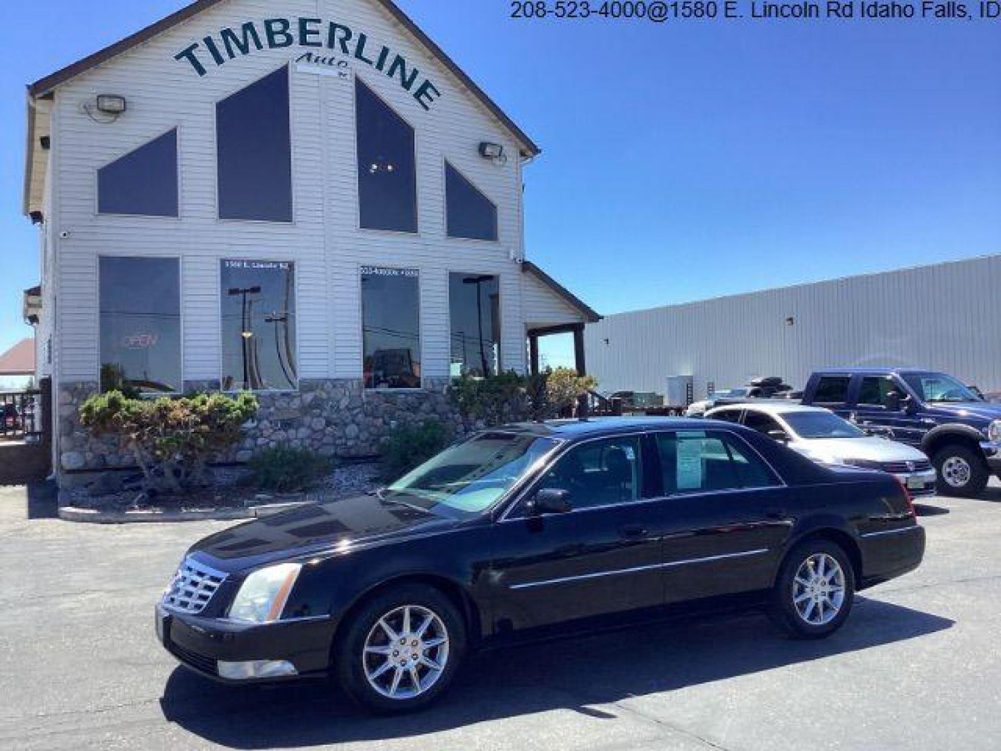 2010 Black Raven Cadillac DTS Luxury (1G6KD5EY1AU) with an 4.6L V8 DOHC 32V engine, 4-Speed Automatic transmission, located at 1235 N Woodruff Ave., Idaho Falls, 83401, (208) 523-1053, 43.507172, -112.000488 - The 2010 Cadillac DTS Luxury is a full-size luxury sedan that offers a range of premium features, a comfortable ride, and advanced technology. Here are the key features of the 2010 Cadillac DTS Luxury: Engine and Performance Engine: 4.6-liter Northstar V8 engine Horsepower: 275 hp @ 6,000 rpm Torqu - Photo#0