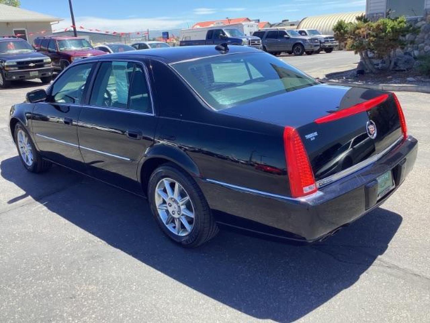 2010 Black Raven Cadillac DTS Luxury (1G6KD5EY1AU) with an 4.6L V8 DOHC 32V engine, 4-Speed Automatic transmission, located at 1235 N Woodruff Ave., Idaho Falls, 83401, (208) 523-1053, 43.507172, -112.000488 - The 2010 Cadillac DTS Luxury is a full-size luxury sedan that offers a range of premium features, a comfortable ride, and advanced technology. Here are the key features of the 2010 Cadillac DTS Luxury: Engine and Performance Engine: 4.6-liter Northstar V8 engine Horsepower: 275 hp @ 6,000 rpm Torqu - Photo#1