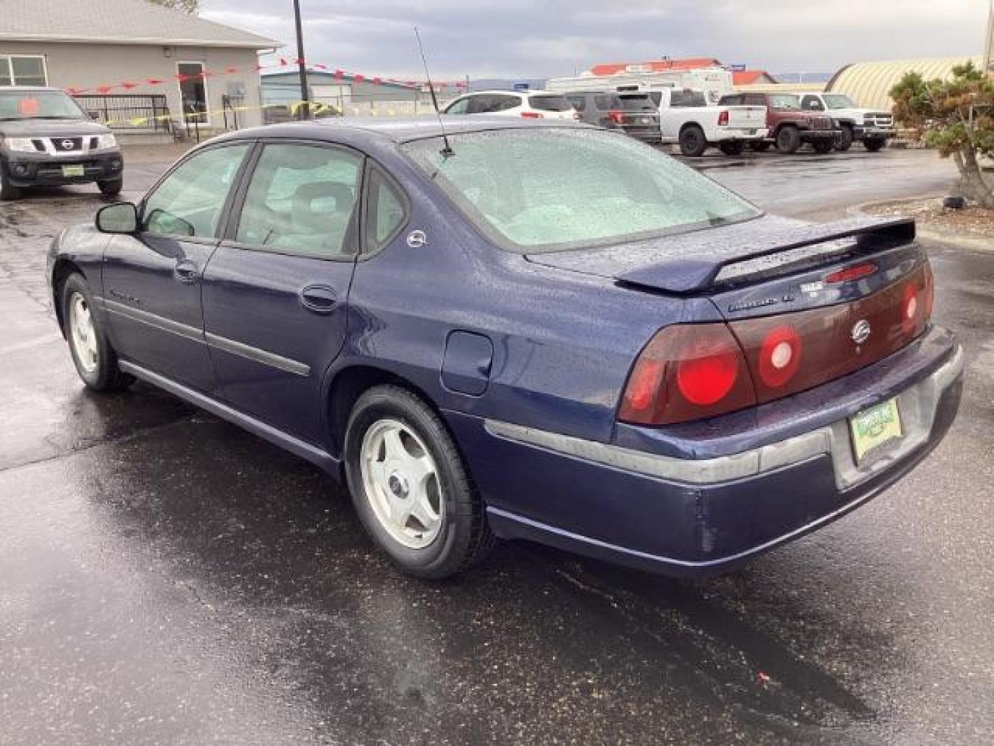 2001 Navy Blue Metallic Chevrolet Impala LS (2G1WH55K519) with an 3.8L V6 OHV 12V engine, 4-Speed Automatic transmission, located at 1235 N Woodruff Ave., Idaho Falls, 83401, (208) 523-1053, 43.507172, -112.000488 - The 2001 Chevrolet Impala LS, a midsize sedan, typically came with several standard features and optional upgrades. Here are some common features found on the 2001 Chevrolet Impala LS: Engine: The Impala LS often featured a 3.8-liter V6 engine, which provided a good balance of power and fuel effici - Photo#2