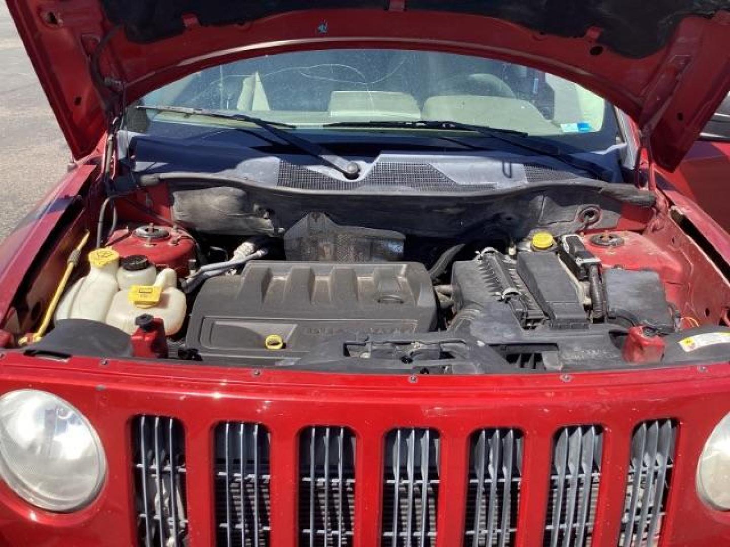 2008 Inferno Red Crystal Pearl /Dark Slate Gray Cloth Interior Jeep Patriot Sport 4WD (1J8FF28W28D) with an 2.4L L4 DOHC 16V engine, located at 1235 N Woodruff Ave., Idaho Falls, 83401, (208) 523-1053, 43.507172, -112.000488 - The 2008 Jeep Patriot Sport offers a combination of rugged styling, practicality, and capability. Here are some key features you can typically find in the 2008 Jeep Patriot Sport: Engine Options: The Patriot Sport typically comes with a choice of two engine options: 2.0-liter four-cylinder engine: - Photo#8