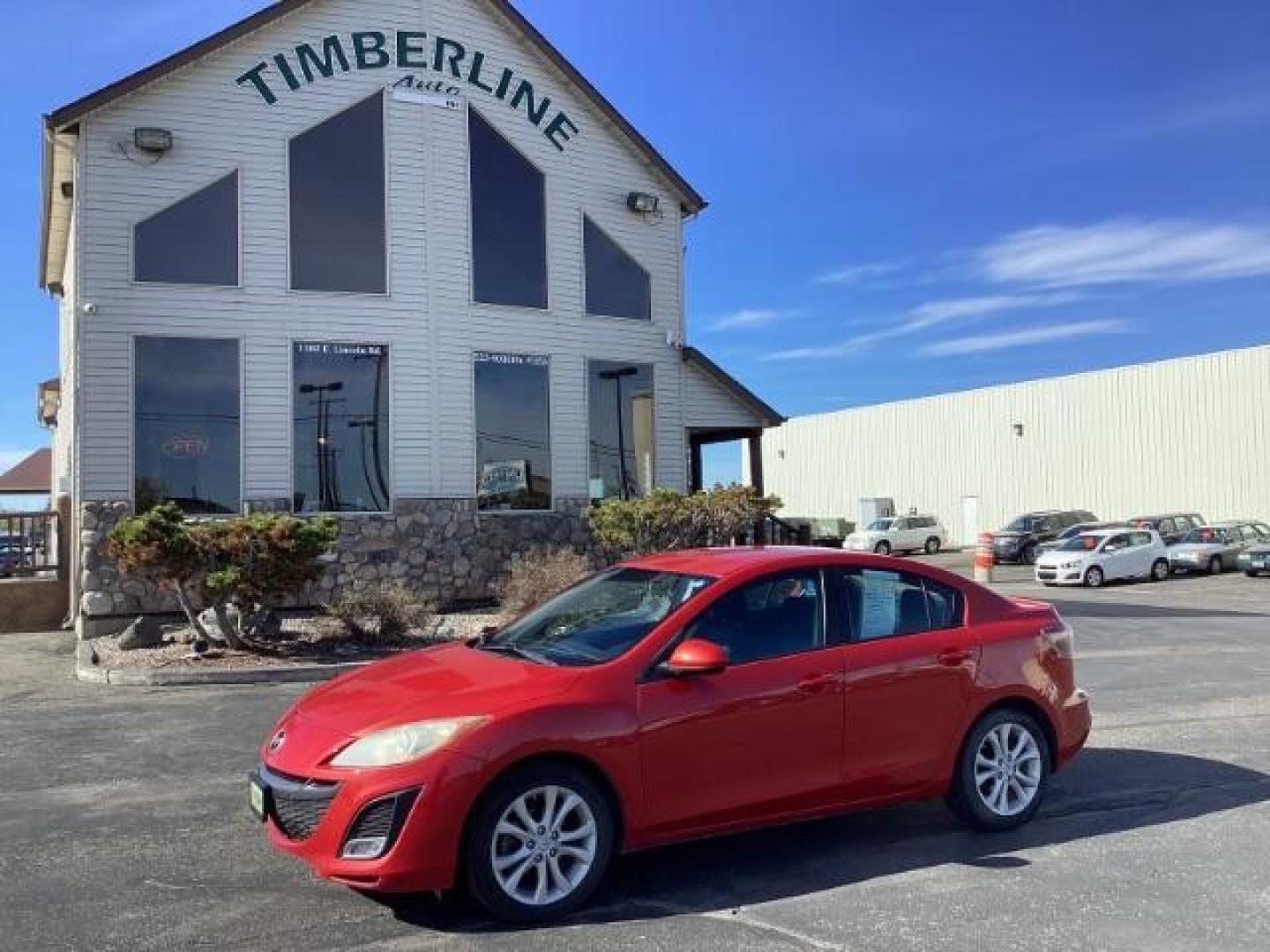 2010 Velocity Red Mica Mazda MAZDA3 s Sport 4-Door (JM1BL1S69A1) with an 2.5L L4 DOHC 16V engine, located at 1235 N Woodruff Ave., Idaho Falls, 83401, (208) 523-1053, 43.507172, -112.000488 - The 2010 Mazda 3 sedan typically comes with a range of features, varying across different trim levels. Here are some common features you might find: Engine Options: The 2010 Mazda 3 sedan may have different engine options, including a 2.0-liter inline-four engine or a 2.5-liter inline-four engine, - Photo#0