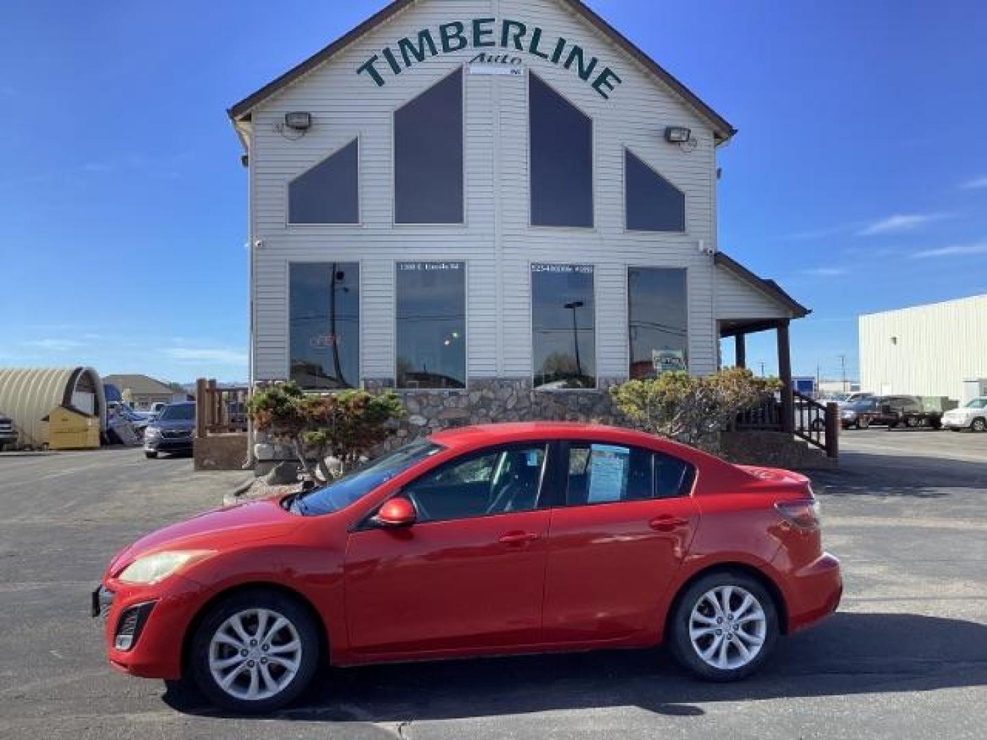 2010 Velocity Red Mica Mazda MAZDA3 s Sport 4-Door (JM1BL1S69A1) with an 2.5L L4 DOHC 16V engine, located at 1235 N Woodruff Ave., Idaho Falls, 83401, (208) 523-1053, 43.507172, -112.000488 - The 2010 Mazda 3 sedan typically comes with a range of features, varying across different trim levels. Here are some common features you might find: Engine Options: The 2010 Mazda 3 sedan may have different engine options, including a 2.0-liter inline-four engine or a 2.5-liter inline-four engine, - Photo#1