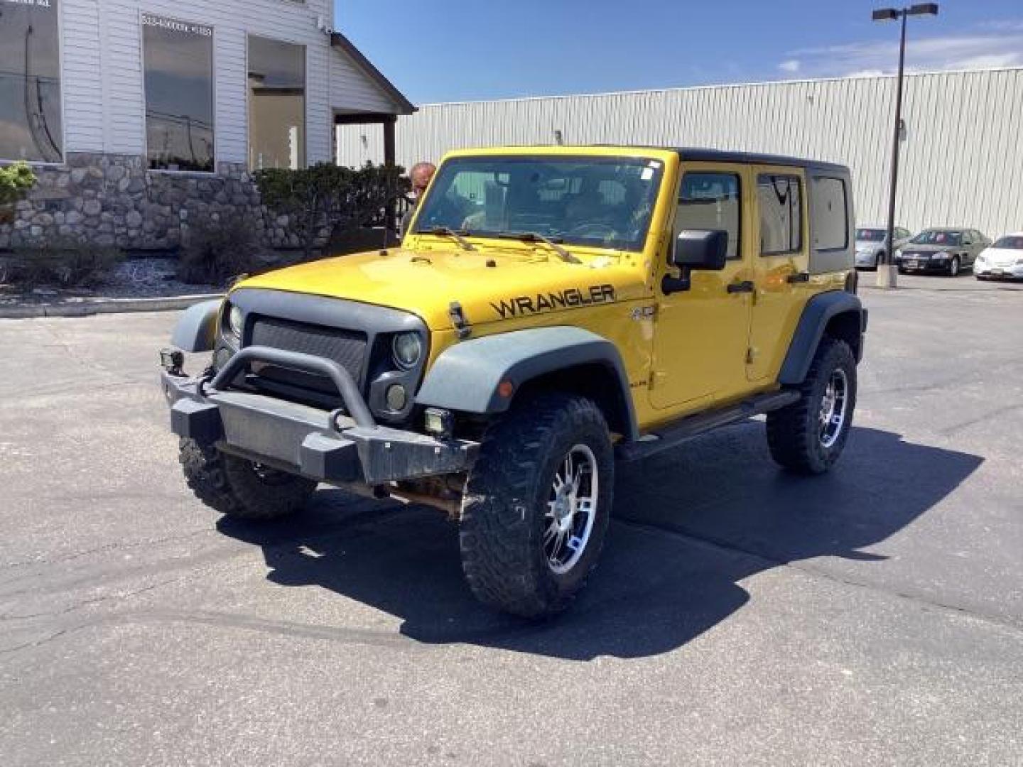 2008 YELLOW Jeep Wrangler Unlimited X 4WD (1J4GA39198L) with an 3.8L V6 OHV 12V engine, located at 1235 N Woodruff Ave., Idaho Falls, 83401, (208) 523-1053, 43.507172, -112.000488 - Photo#0