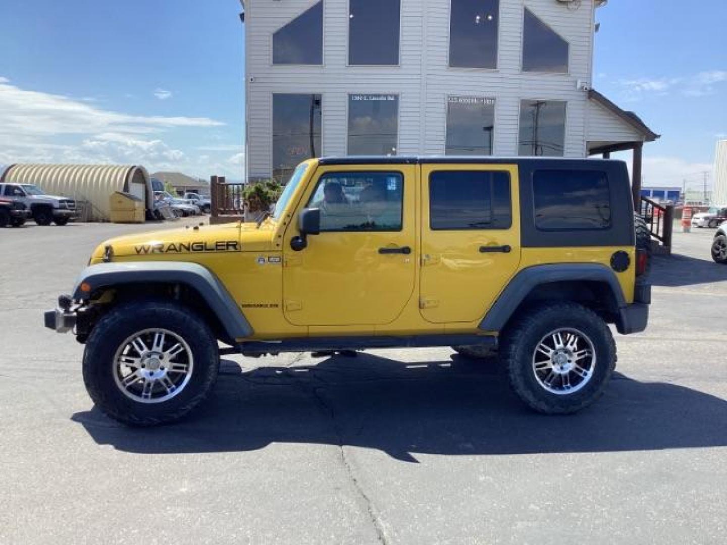 2008 YELLOW Jeep Wrangler Unlimited X 4WD (1J4GA39198L) with an 3.8L V6 OHV 12V engine, located at 1235 N Woodruff Ave., Idaho Falls, 83401, (208) 523-1053, 43.507172, -112.000488 - Photo#1