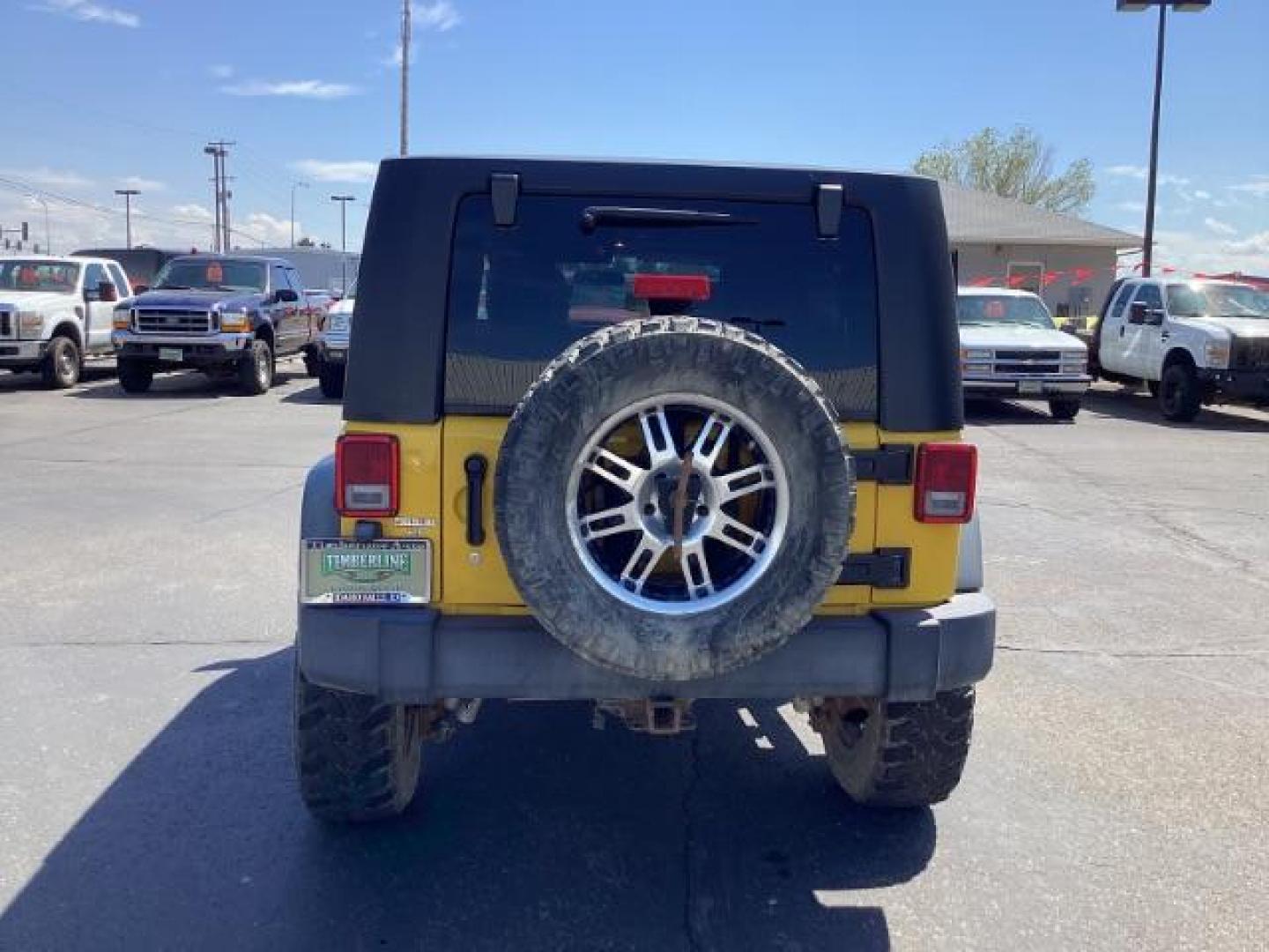 2008 YELLOW Jeep Wrangler Unlimited X 4WD (1J4GA39198L) with an 3.8L V6 OHV 12V engine, located at 1235 N Woodruff Ave., Idaho Falls, 83401, (208) 523-1053, 43.507172, -112.000488 - Photo#3